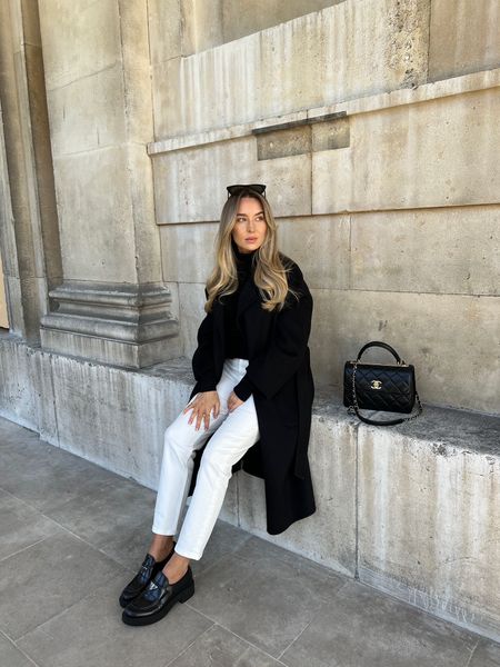 Black and white outfit for autumn winter. Created with staples pieces from my wardrobe which can be worn year on year! White jeans, black prada loafers, Chanel trendy cc bag, black cashmere blend coat, cashmere roll next top & sunnies  

#LTKstyletip #LTKshoecrush #LTKSeasonal