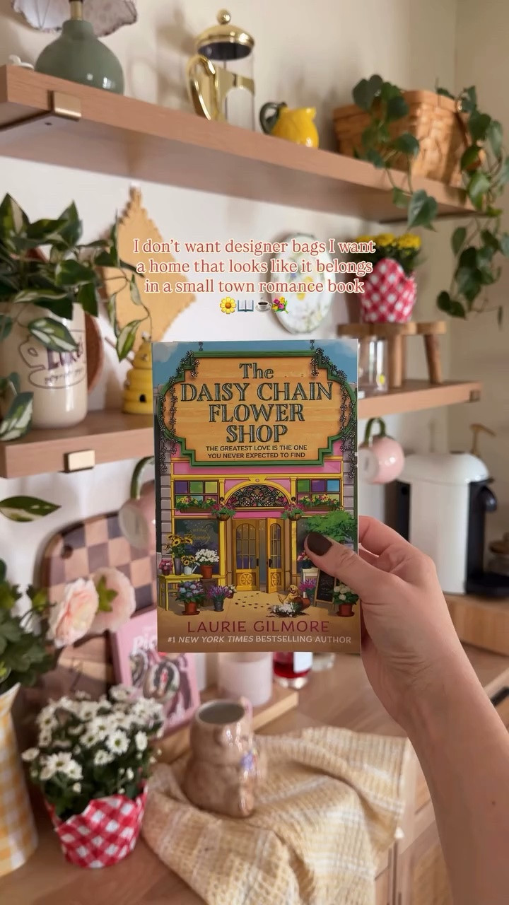 admit one to the small town romance book club ☕️📖
I LOVE a good small town romance book or tv show because the setting just immediately transports me to the cozy vibes so why not bring that to my own space! 

I’m not just standing in my kitchen, I’m in a cozy, colorful flower shop surrounded by whimsy and the smell of fresh cut daisies 🌼 of instead of sitting in my dining room, I’m sitting in a cozy cafe with the smell of fresh baked muffins and coffee brewing nonstop ☕️

You already know I’m dreaming of all the ways I’m going to bring the Dream Harbor, pumpkin spice, Stars Hollow vibes to life in my space for fall! 🧡🍂

#cozyhomedecor #cozyhomevibes #gilmoregirlsaesthetic #whimsicalhome #bookishvibes cozy home vibes, dream harbor, small town romance books, cozy bookish vibes, small home, cozy decor, fall vibes, Gilmore girls, stars hollow aesthetic