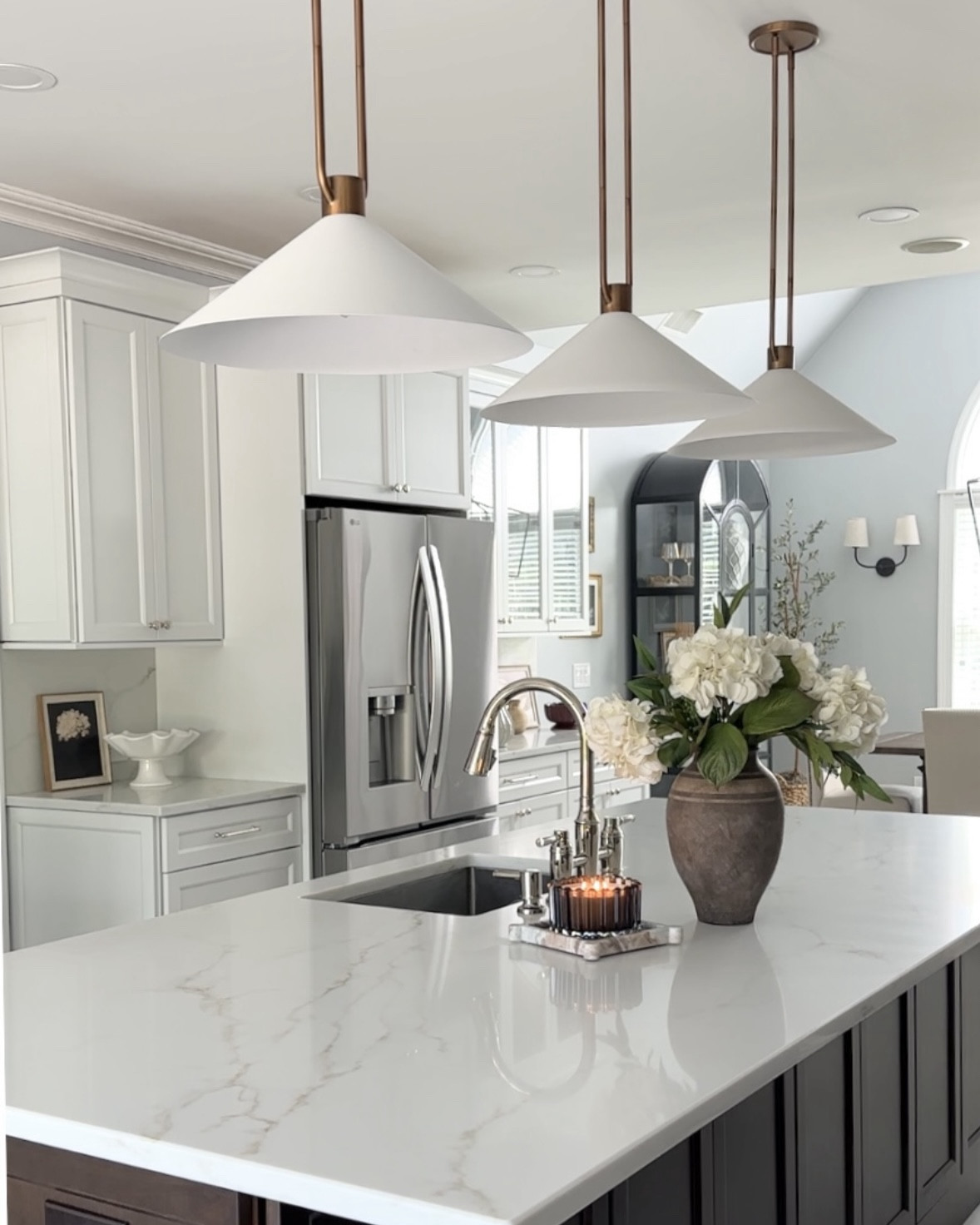 Swipe for more Kitchen island styling! Shop new pendants, sconces, vases, fall candle, marble trays, florals, wall artwork, black display cabinet + more finds! Kitchen stool ideas  Crate and Barrel, McGee & Co, Pottery Barn. 

#LTKFindsUnder50 #LTKStyleTip #LTKHome