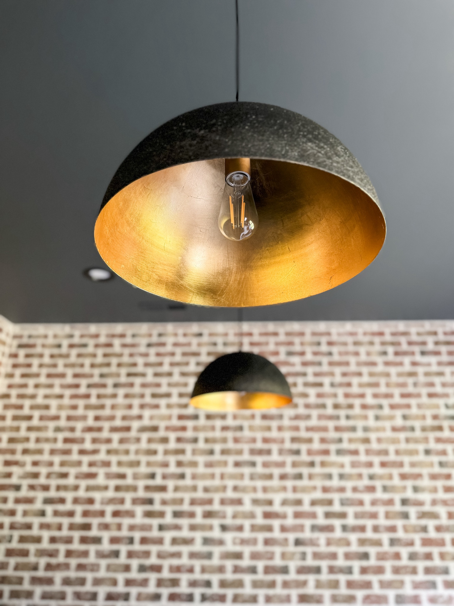 New bar pendants. Love the hammered metal and the brass detailing.

#LTKHome