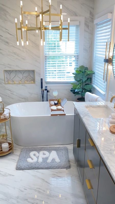 The before and after you have to see to believe! This bathroom makeover is still one of my favorite projects. Check out these bathroom vanities, lighting and decor finds to turn your space into a cozy yet luxe bathroom oasis!

#LTKFamily #LTKSaleAlert #LTKHome