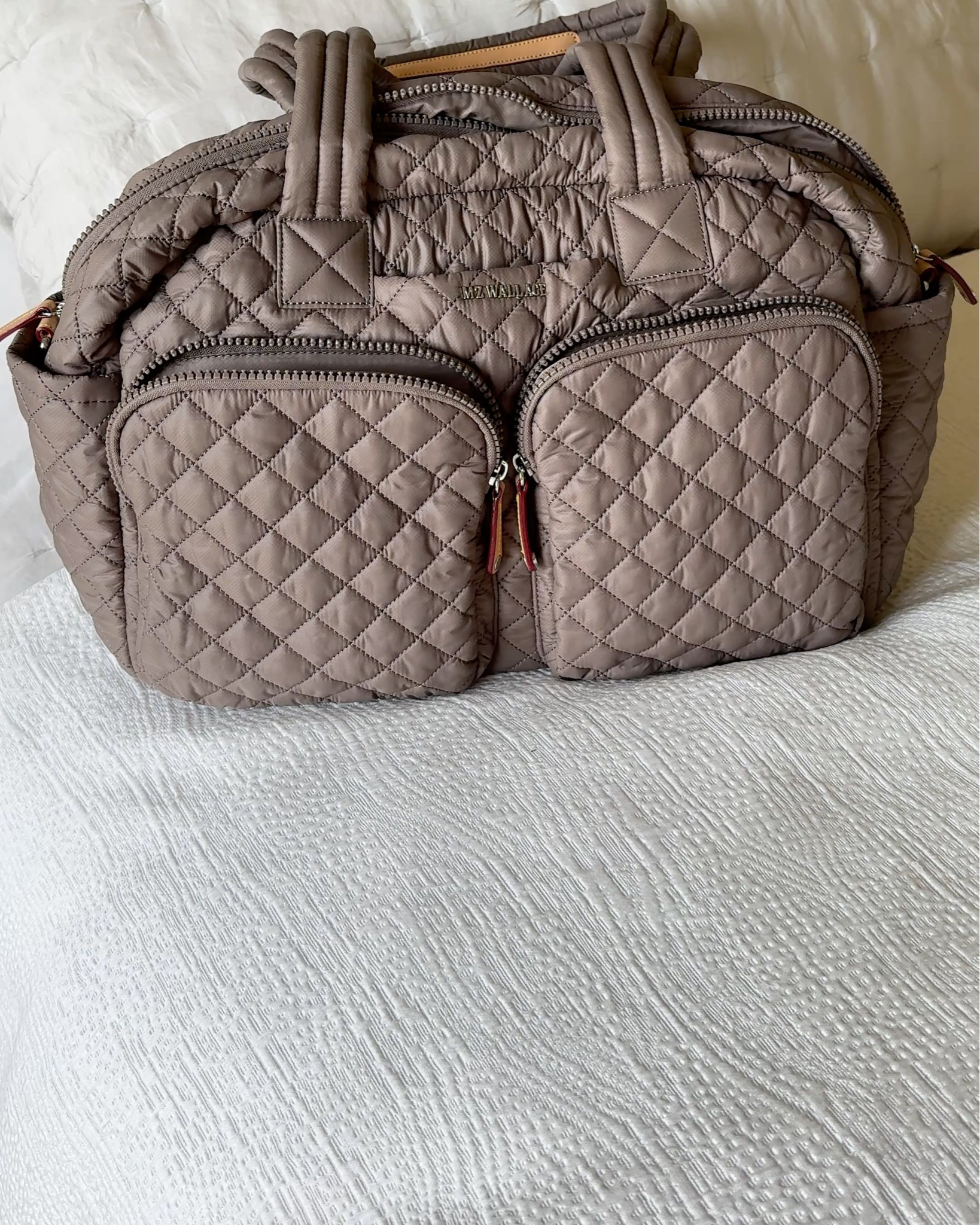 Travel bag. Travel outfit. Spring break. Resort wear. Vacation. 
Chic and functional travel bag. 
Lightweight and quality to last.  
I love the look and thoughtful details. I have used this on a couple of trips now and it works out great for airplane travel- fits under the seat in front of you with your frequently reached for items easily accessible in the multiple exterior compartments. 
It would make a nice gym bag, day bag, weekender bag, or commuter bag as well. 
This exact color is unavailable, I have linked a similar option and a cute new color  


Comment SHOP below 

#LTKTravel #LTKOver40