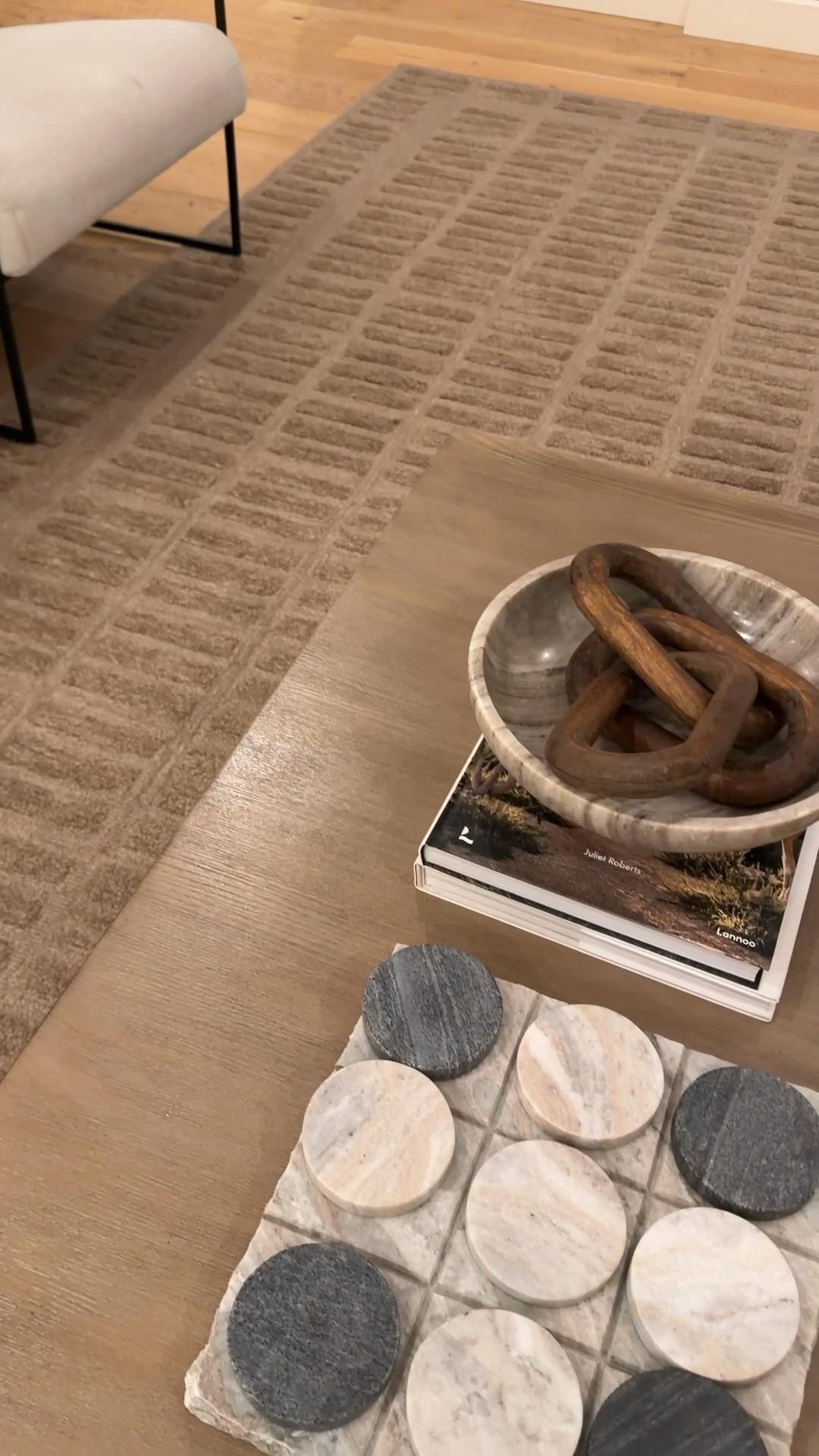 Living room views 

Modern living room decor featuring a best-selling area rug, statement coffee table, granite accent table, and elevated styling details. This space is layered with a popular living room rug that adds warmth and texture, paired with a durable coffee table styled with decorative tic-tac-toe and curated accents. The granite accent table brings a timeless, high-end feel while remaining functional for everyday living. This living room design blends neutral tones, modern organic style, and best-selling home decor pieces that are both practical and visually impactful. Ideal for anyone looking for a polished, lived-in living room with popular furniture, designer-inspired decor, and timeless textures.


#LTKdayinmylife #LTKSeasonal #LTKHome