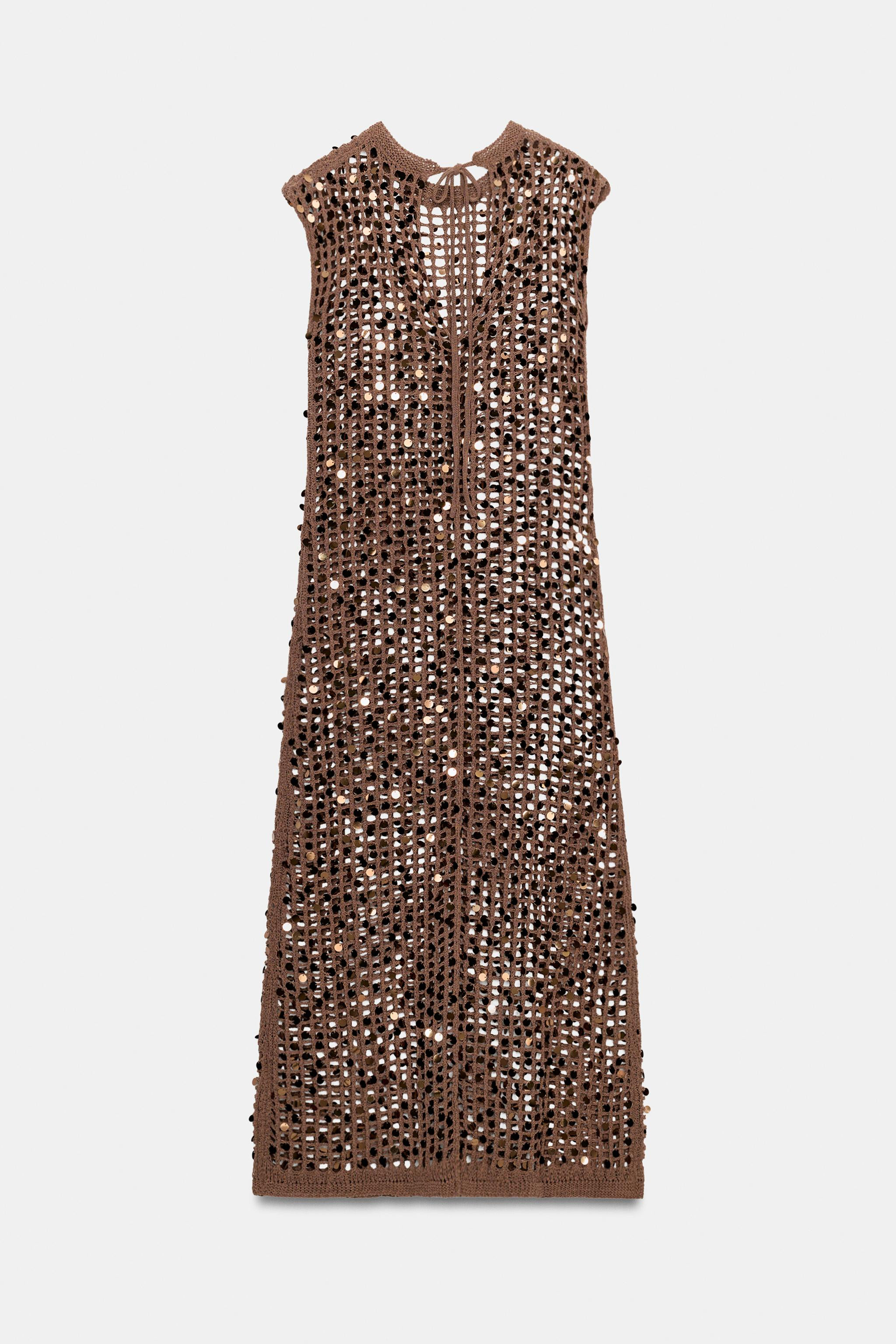 Open knit sequin dress. Features a round neck and sleeveless design. Tie fastening at the back. | Zara UK