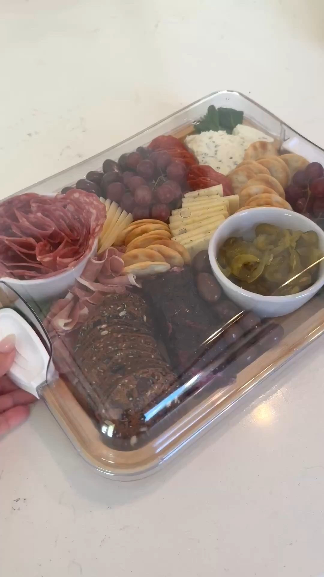 The best gift this holiday season for the ultimate hostess. The traveling charcuterie board tray. 

#LTKFamily #LTKParties #LTKSeasonal
