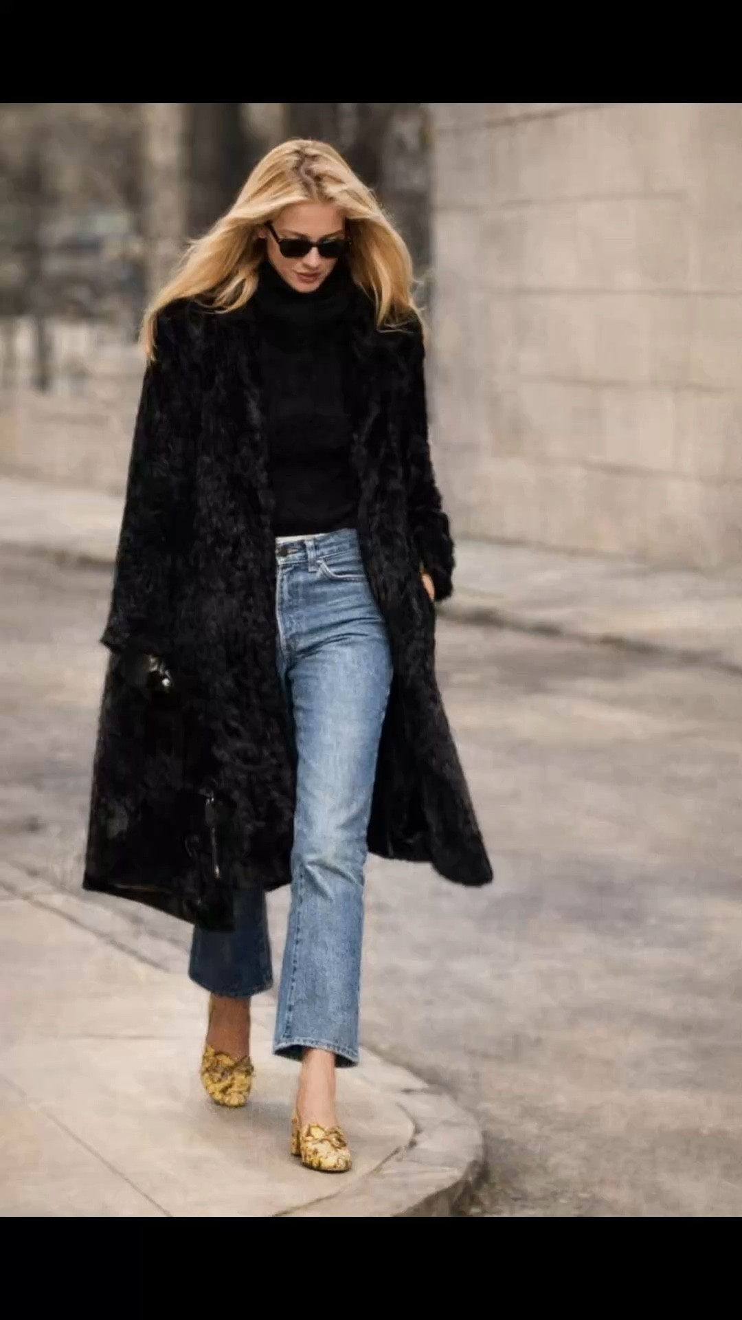 Straight-leg denim is still the most requested silhouette and this is the exact formula that makes it look elevated every time.

A fitted black knit + classic mid-wash jeans creates that clean, repeatable base. Add a structured black top-handle bag, heritage gold watch, oval sunglasses and a polished loafer and the entire look shifts from casual to quiet luxury.

Nothing trend driven. Everything timeless. These are the pieces that work on weekday errands, travel days and dinner and will still be relevant next year.

This is the off-duty uniform inspired by Carolyn Bessette-Kennedy and the effortless denim styling we always see on women with consistent, expensive-looking wardrobes.

Shop the straight-leg jeans, black sweater, structured leather bag, classic loafers, tortoiseshell headband and everyday gold watch in this post.