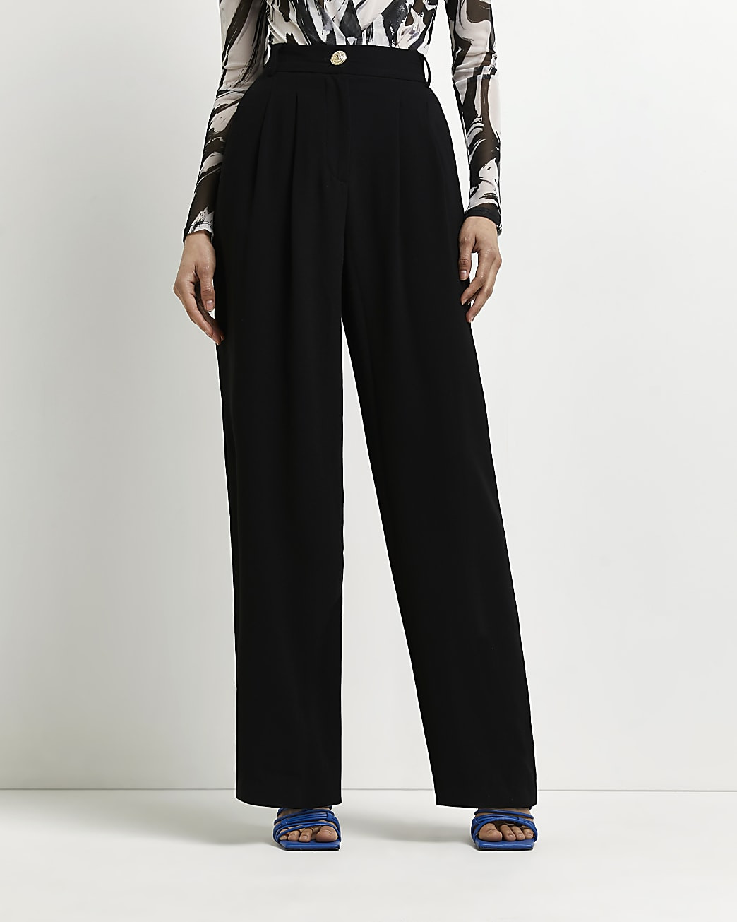 Black wide leg pleated trousers | River Island (UK & IE)