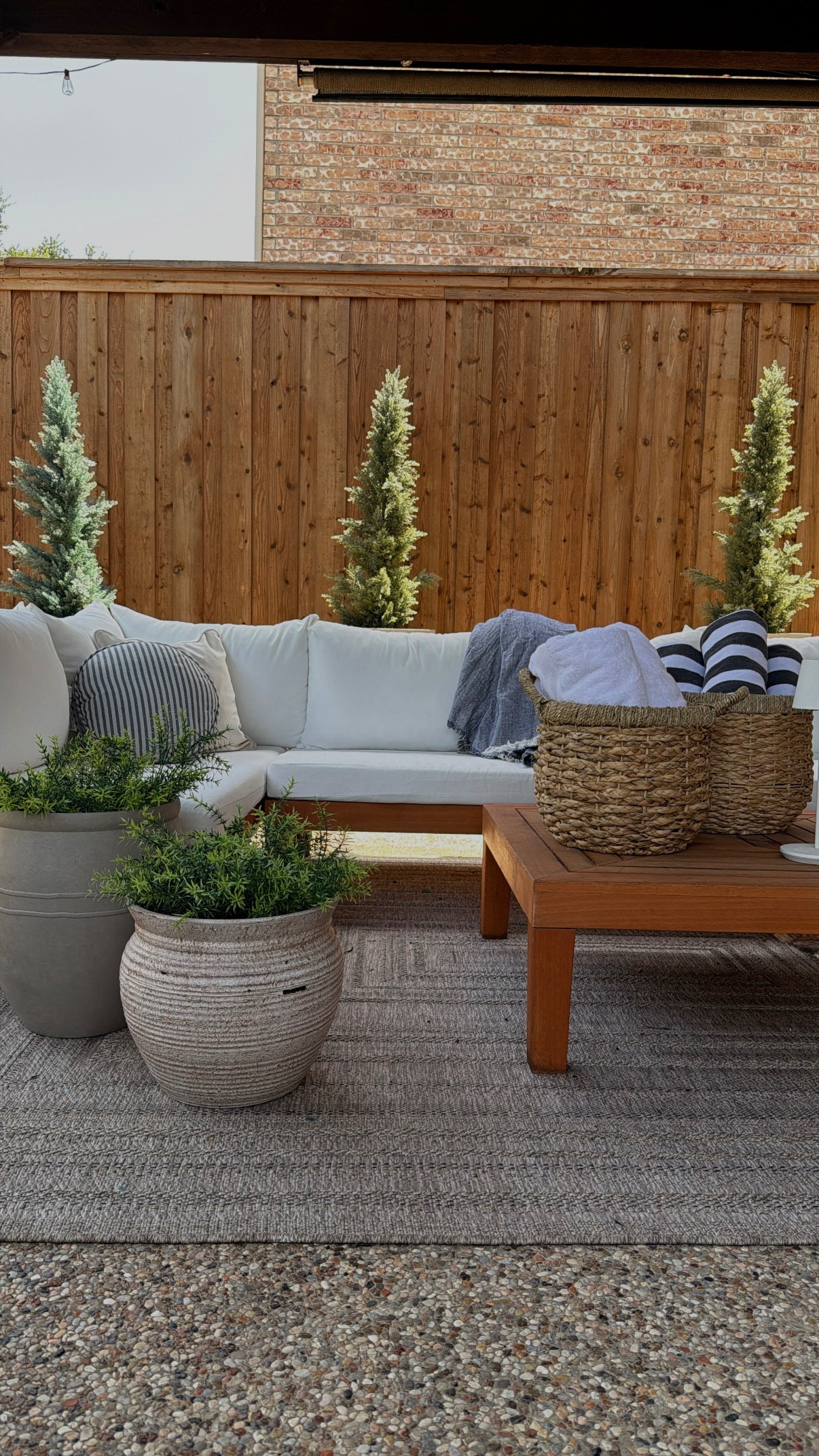 Added two of my favorite @loweshomeimprovement planters and this set of woven baskets for our pool towels and it made for the easiest outdoor refresh!   #ad #lowespartner  

 #LTKSeasonal #LTKHome