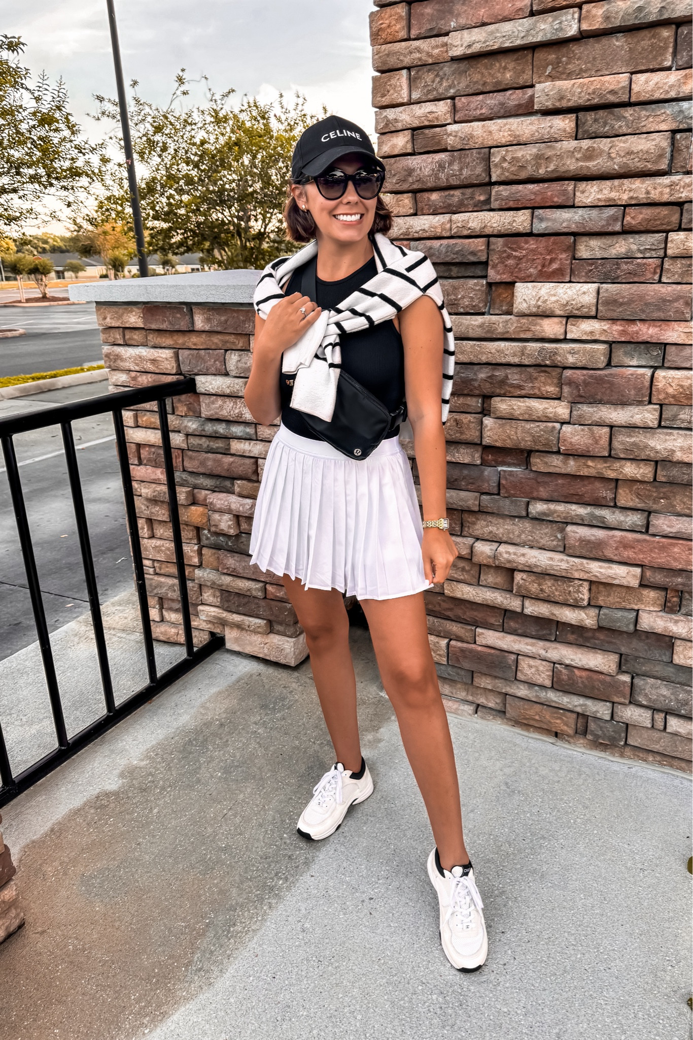 Tennis Outfit 

🖤 Reviews on all products! 
• Lululemon pleated tennis skirt - 6
• Amazon Black square neck bodysuit - S
• Amazon Striped pullover sweater - S
• Lululemon belt bag
• Chanel Sneakers 
• Celine womens baseball cap

Workout Outfit | Athletic Outfits | Athleisure Outfits | Athleisure Outfits Amazon | Gym Outfit | Sneaker Outfit | Sporty Outfit | School Drop Off Outfit | Theme Park Outfit | Pilates Outfit | Yoga Outfit | Jumpsuit Outfit | Travel Outfit | Travel Outfit Amazon | Airport | Airport Looks | Airport Style | Airport Travel | Airport Fashion | Airport Outfit Amazon | Airport Travel Outfit Amazon | Amazon Airport Outfits | Fall Airport Outfit | Fall Airport Outfit | Airplane Outfit | Airplane Travel Outfit | Plane Outfit | Comfy Outfit | Cozy Outfit | Lounge Outfits | old money looks | old money aesthetic | old money fashion | old money style | old money outfits | old money style women | old money | old money fall | neutral outfit | neutral fall outfit | neutral style | classic style | classic outfits | chic outfits | chic fall outfits | chic style | casual chic | quiet luxury | french style | french fashion | french girl style | Parisian chic | Parisian style | minimalist | minimalist fashion | capsule wardrobe | capsule wardrobe fall | petite outfits 

#LTKActive #LTKStyleTip #LTKFitness #LTKShoeCrush #LTKSeasonal #LTKItBag