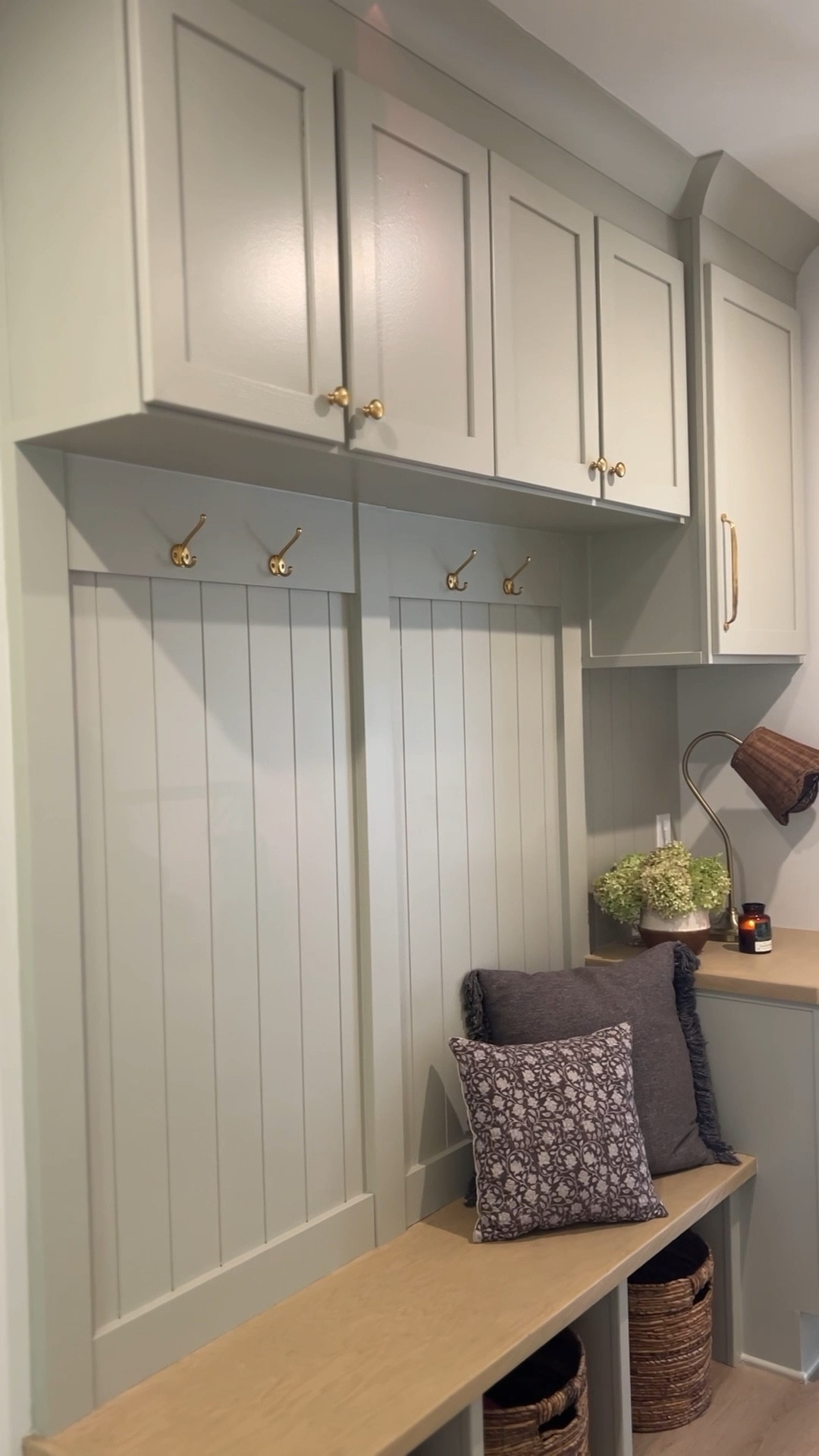 Mudroom details ✨

Cabinet hardware is linked & the color is unlaquered brass 

Paint color is jogging path by Sherwin Williams 
