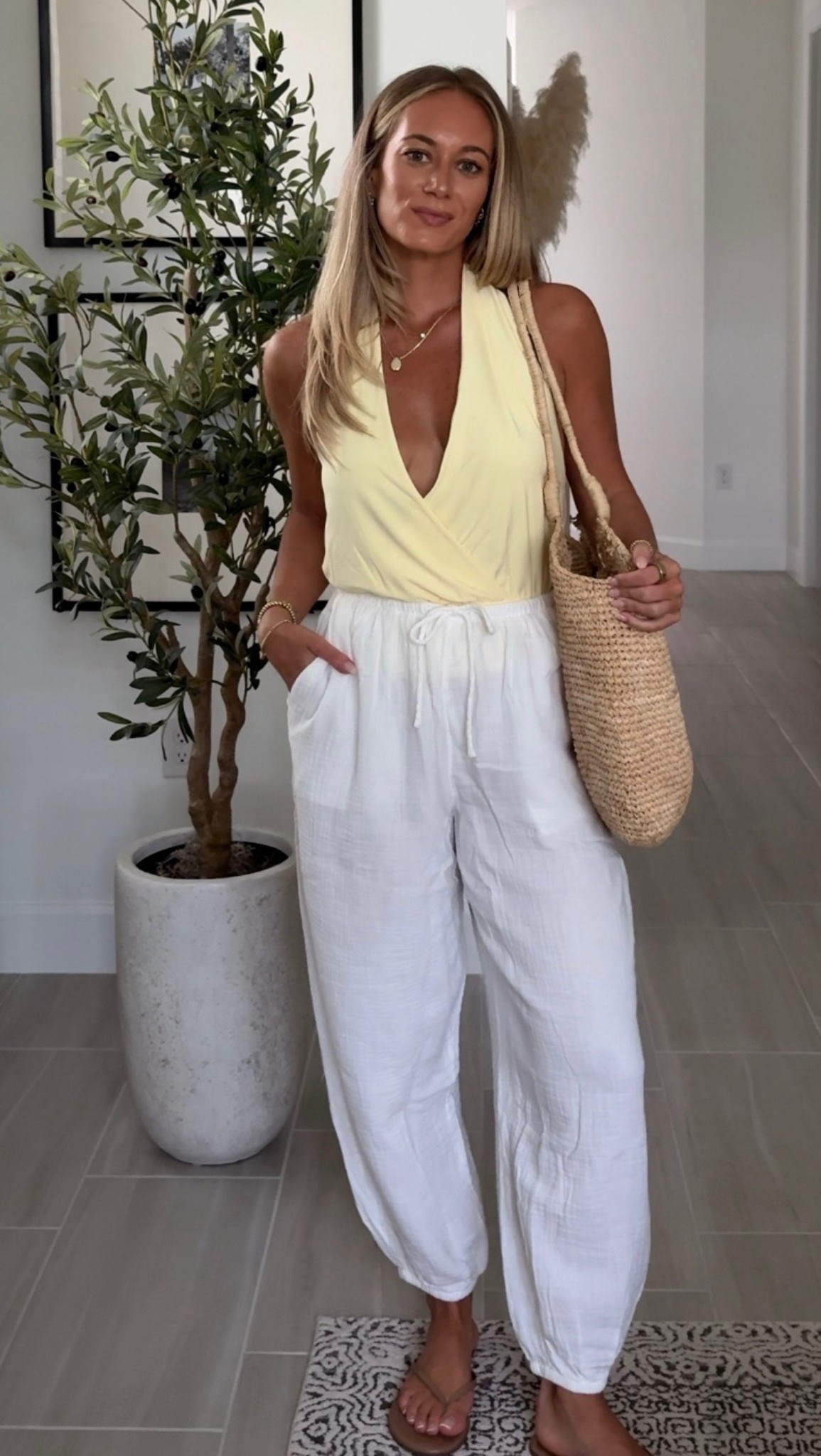 Styling my latest @Aritzia   haul, this butter yellow halter with linen balloon pants and a straw bag is perfection!

Wearing S in both

linen pants, balloon pants, halter top, yellow halter, straw bag, summer outfit, Aritzia outfit, elevated essentials, resort wear, vacation outfit, spring outfit, outfit inspo

#LTKootd #LTKSeasonal #LTKTravel