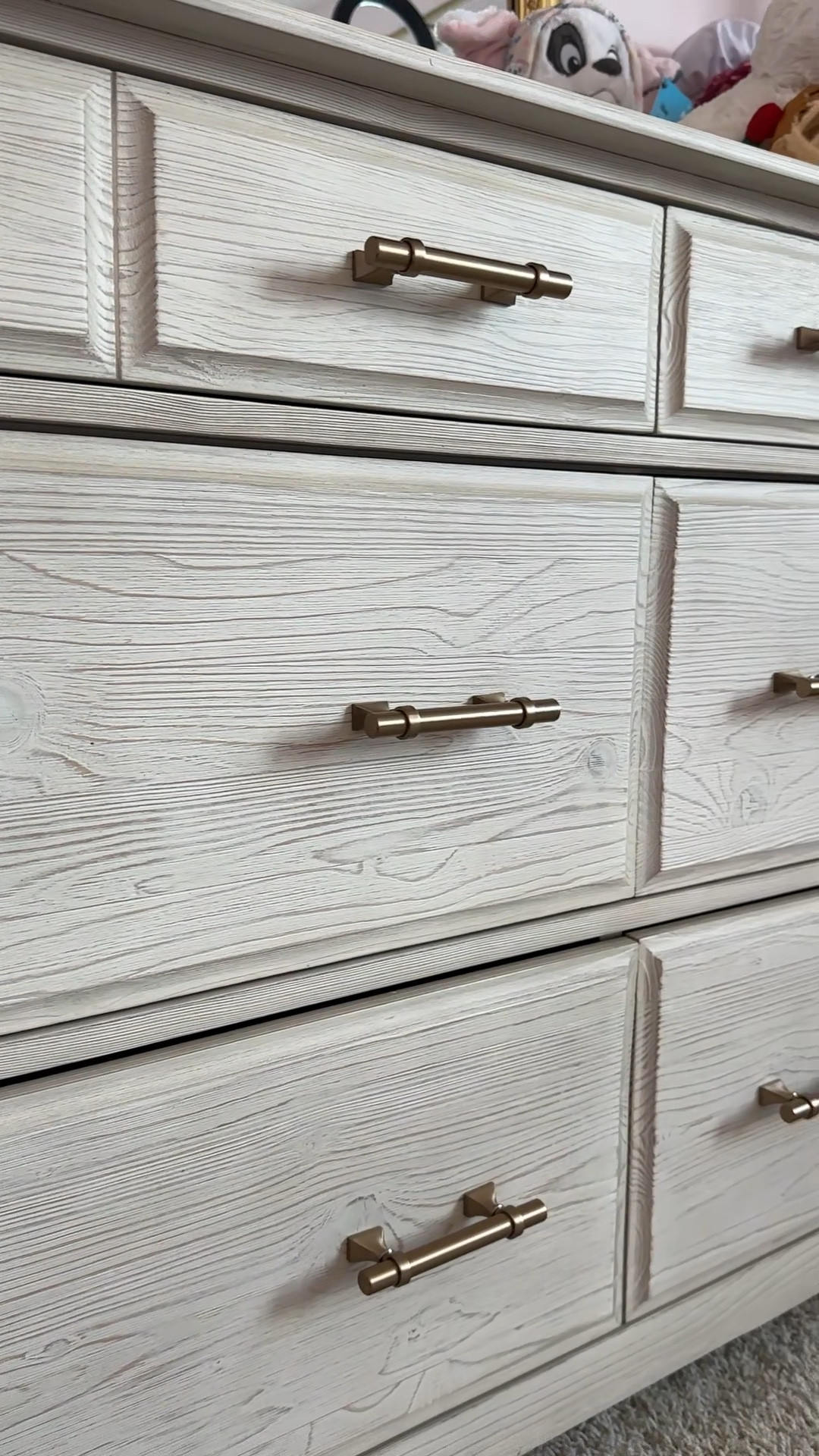 We updated the drawer pulls on our nursery dresser! The gold will help tie in all the gold accents in her room. Linking nursery dresser + the pulls. We had limited options for pulls due to the specific hole size on the dresser. 

Nursery / baby girl nursery / nursery DIY / cabinet pulls / cabinet knobs 

#LTKBaby #LTKHome