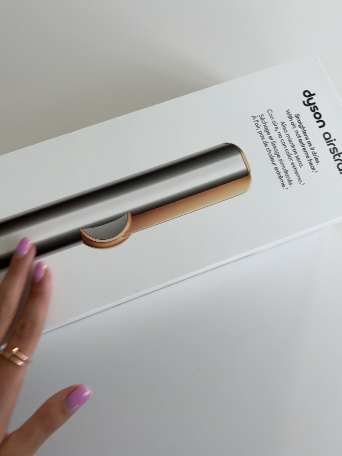 Transform your hair game with the Dyson Airstrait™ hair straightener in nickel copper. Effortless style, redefined. #DysonHair