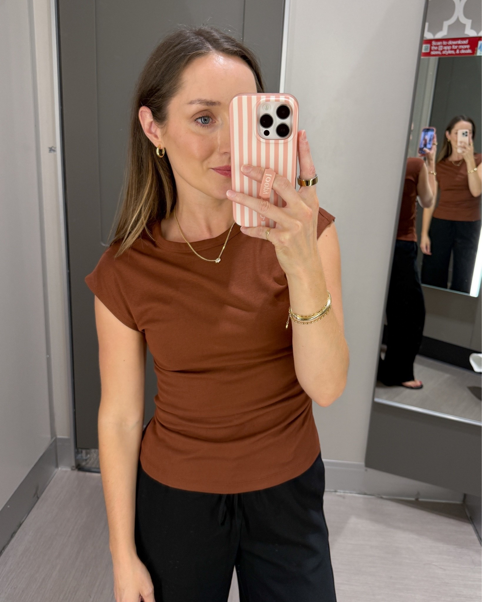 This cap sleeve top has ruching on one side and the fit is actually excellent. Cute little top that you could dress up or down. wearing XS.￼