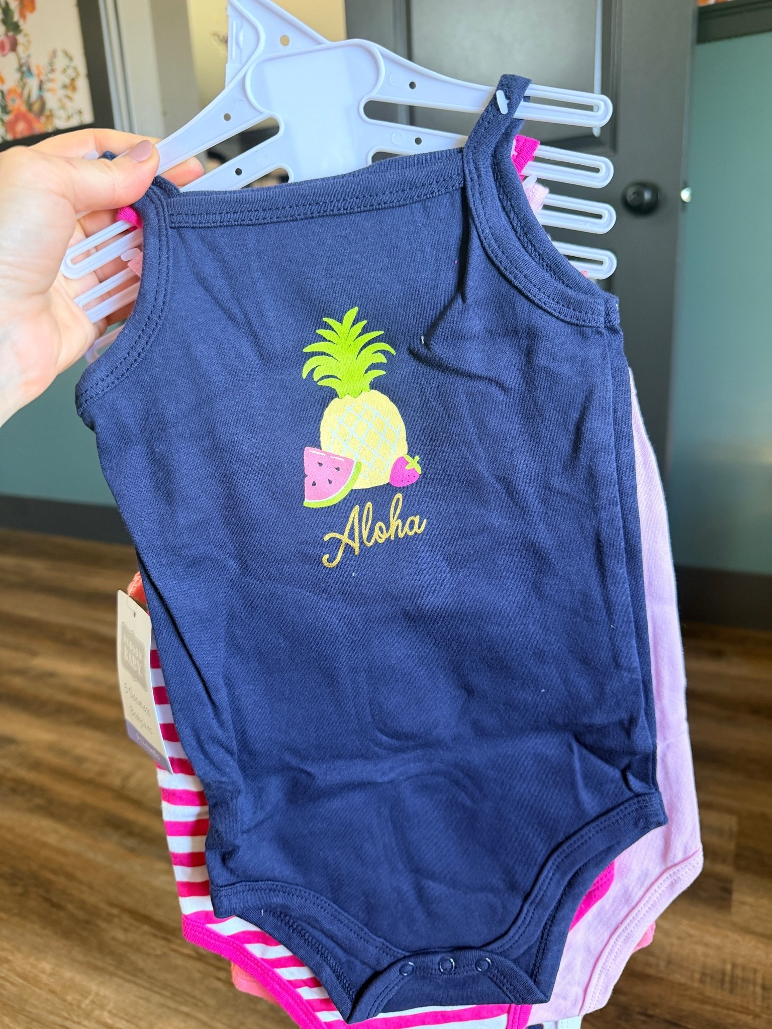 Say hello to summer with the ultimate budget-friendly find! The absolute cutest baby girl summer outfit multi-pack that is perfect for warm weather. This navy blue baby bodysuit features a darling tropical fruit graphic with a pineapple, watermelon slice, strawberry, and a gold "Aloha" script.
If you are looking for affordable baby clothes that don't sacrifice style, this multi-pack bundle is a total win. It comes layered with coordinating pieces—including a bright pink and white striped option and a soft lilac purple bodysuit—giving you multiple mix-and-match infant girl summer clothes for one low price!
Made from ultra-soft, breathable cotton, these sleeveless baby bodysuits (camisole/tank style) are perfect for:
☀️ Hot summer days & backyard play
🏖️ Tropical family vacations & beach trips
🍉 Everyday summer baby style & easy diaper changes
Whether you're shopping for a baby shower gift, updating your little one's summer wardrobe, or hunting for the best target baby finds and boutique styles on a budget, these are a must-have!
baby girl summer outfits, navy blue baby bodysuit, tropical baby clothes, pineapple baby outfit, sleeveless infant bodysuits, baby girl multi-pack clothes, affordable baby boutique, toddler summer fashion, aloha baby clothes, budget-friendly baby finds. 
 

 #LTKSeasonal #LTKBaby #LTKKids