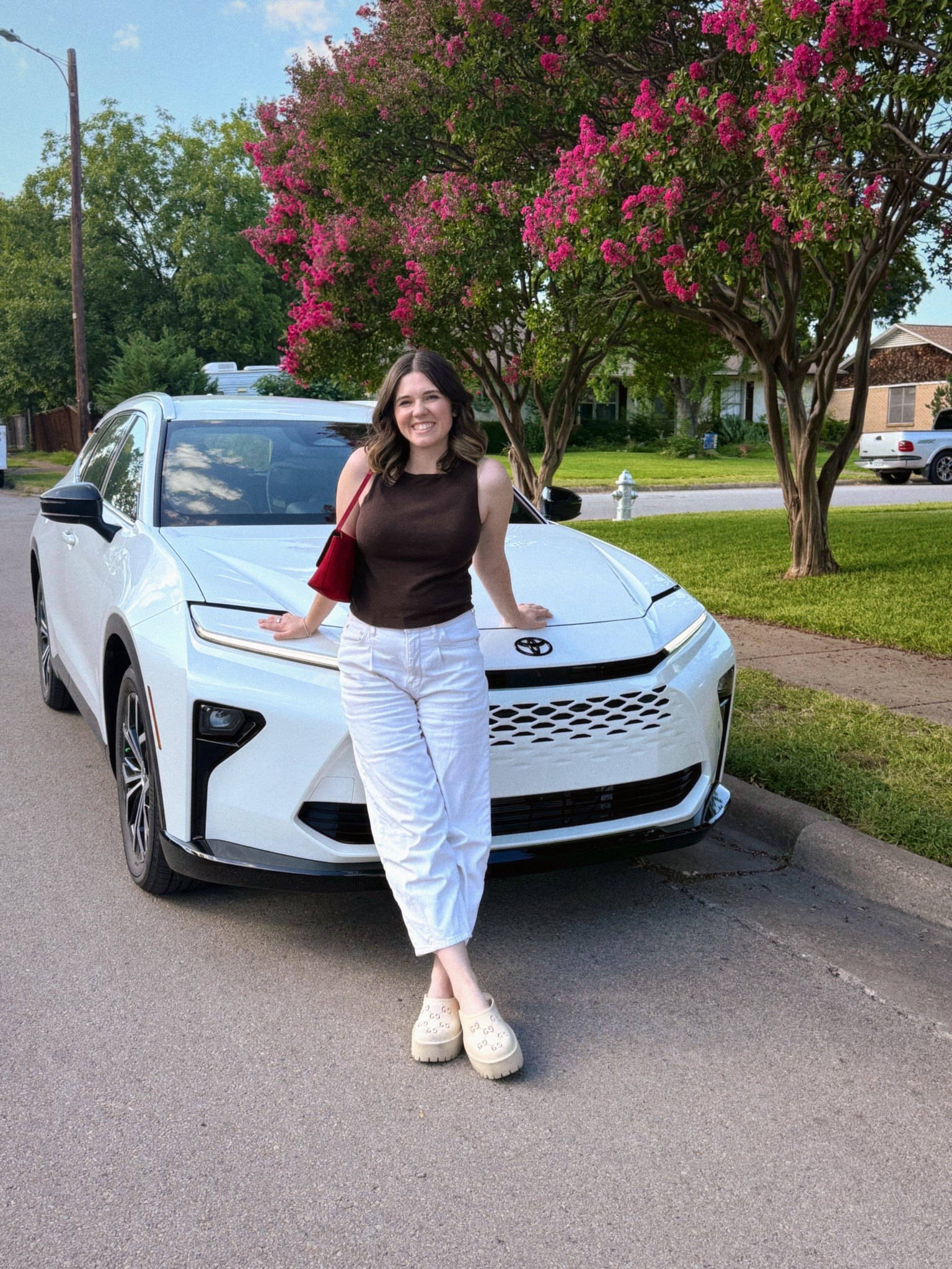 Reformation brown knit tank (size down) 
Old jeans from Anthropologie 
Gucci clogs 
Madewell red purse 

#LTKShoeCrush #LTKStyleTip