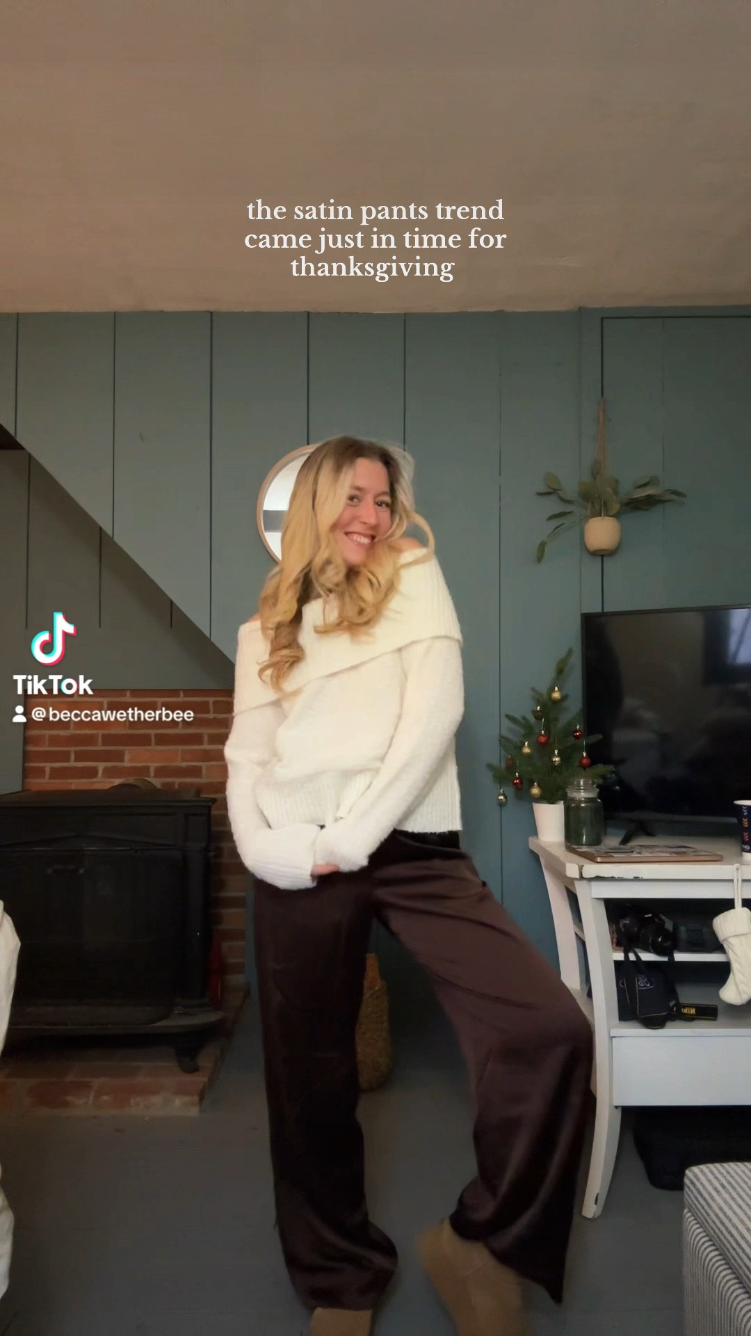 thanksgiving outfit brown silk pants off the shoulder white sweater