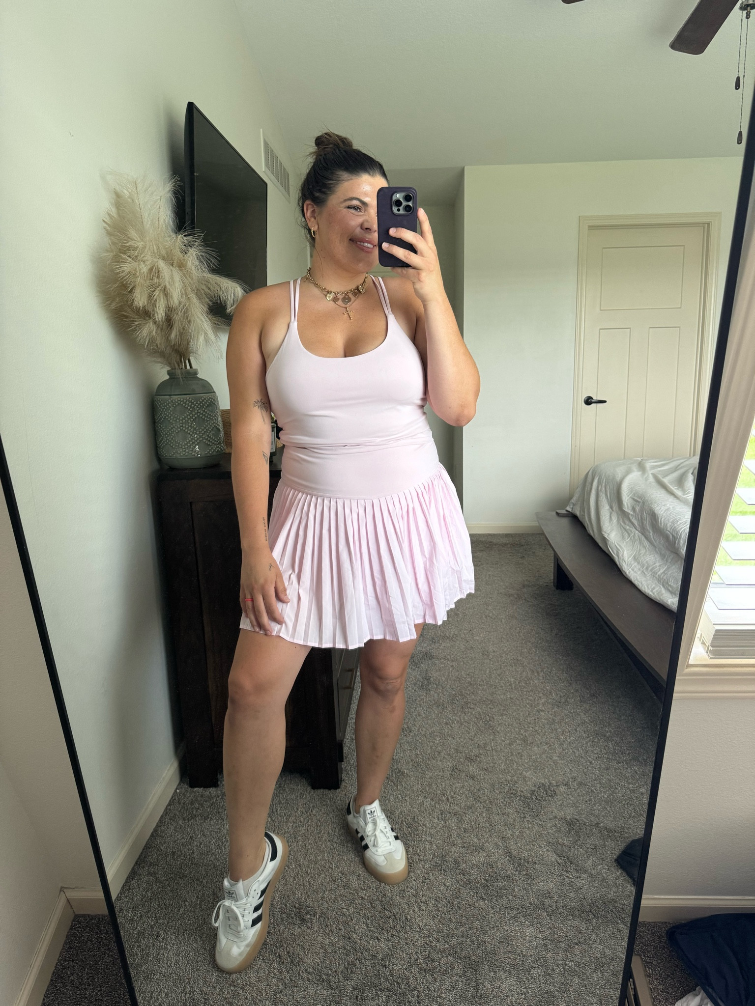 Midsize summer Athleisure look with a skirt and tank! Everything is from Fabletics. 

#LTKStyleTip #LTKSeasonal #LTKTravel