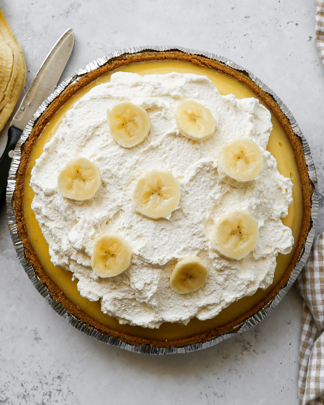 This banana cream pie is made completely from scratch and I use these exact tools to make it every time.
I whisk together the eggs in the Pyrex Essentials Glass Mixing Bowls and cook the custard right in the Our Place Mini Perfect Pot, using the OXO Good Grips Balloon Whisk to keep everything smooth while tempering the eggs. The OXO Good Grips Mini Strainer is perfect for sifting the powdered sugar for the whipped cream, which I whip up in my KitchenAid Stand Mixer until it holds stiff peaks. The HENCKELS Paring Knives make quick work of slicing the bananas for layering.
Shop everything I used linked in this post so you can make a pie of your own. 

 #LTKdayinmylife #LTKfoodie #LTKHome