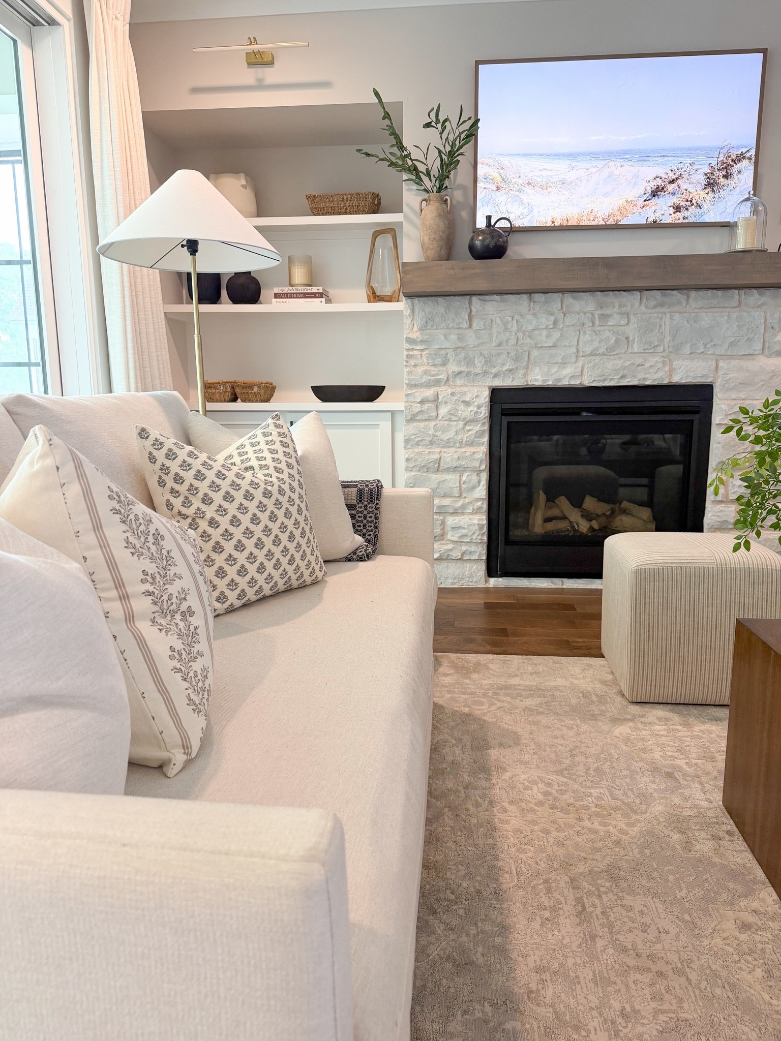 Modern living room, living room sofa, neutral sofa, interior define sofa, frame TV, Samsung frame TV, brick fireplace, transitional living room, modern Classic living room

#LTKmomlife #LTKHome