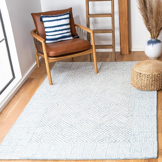 SAFAVIEH Roslyn Collection Area Rug - 5' x 8', Light Blue & Ivory, Handmade Wool, Ideal for High ... | Amazon (US)
