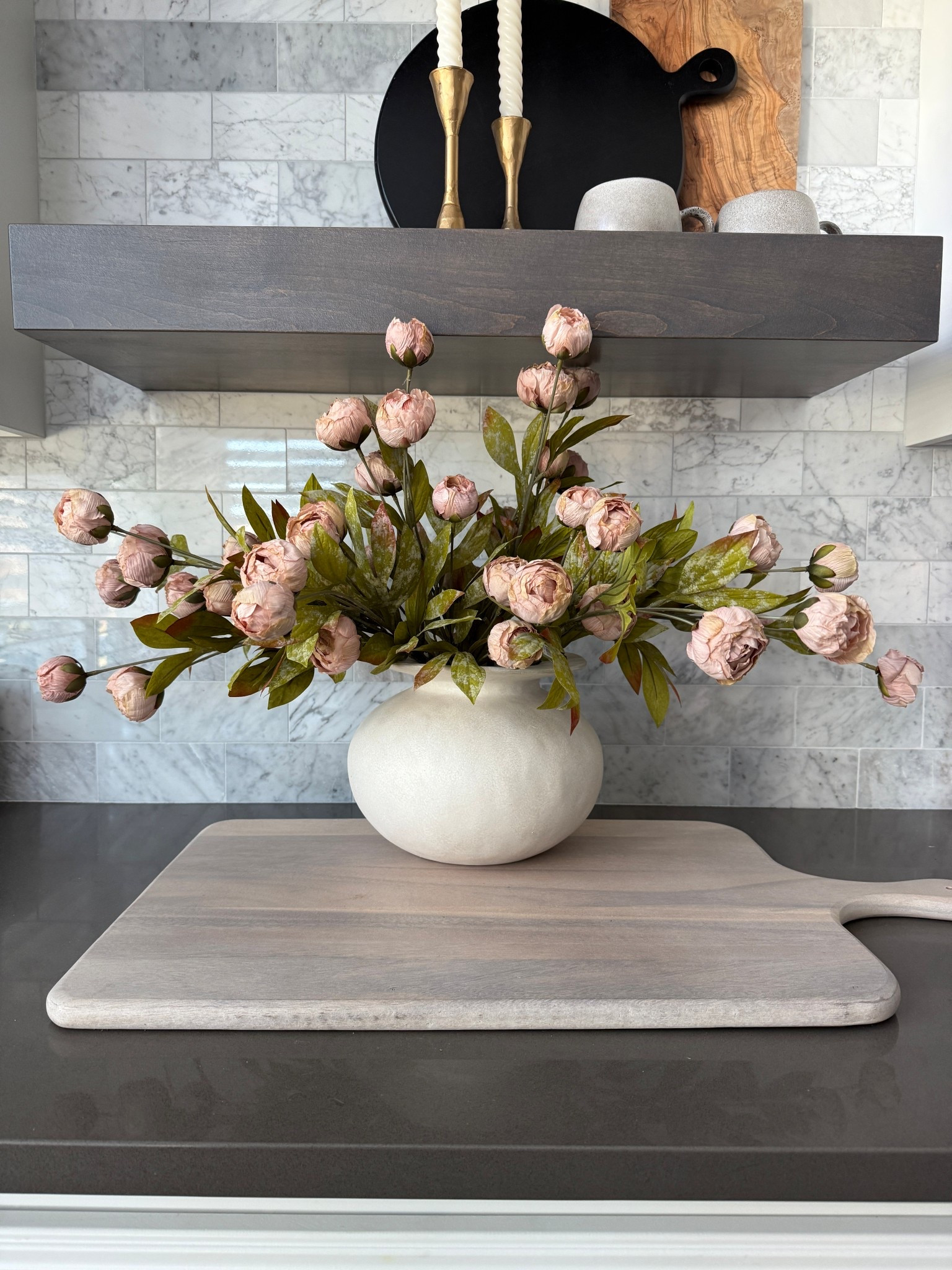 BACK IN STOCK!!! These will absolutely sell out quickly! Viral peonies! This is the “tan” color but they look like a dusty rose color to me. I used 11 here, I would recommend buying the 16 pack for the best value and for free shipping! 

#LTKSpringSale #LTKHome #LTKSeasonal