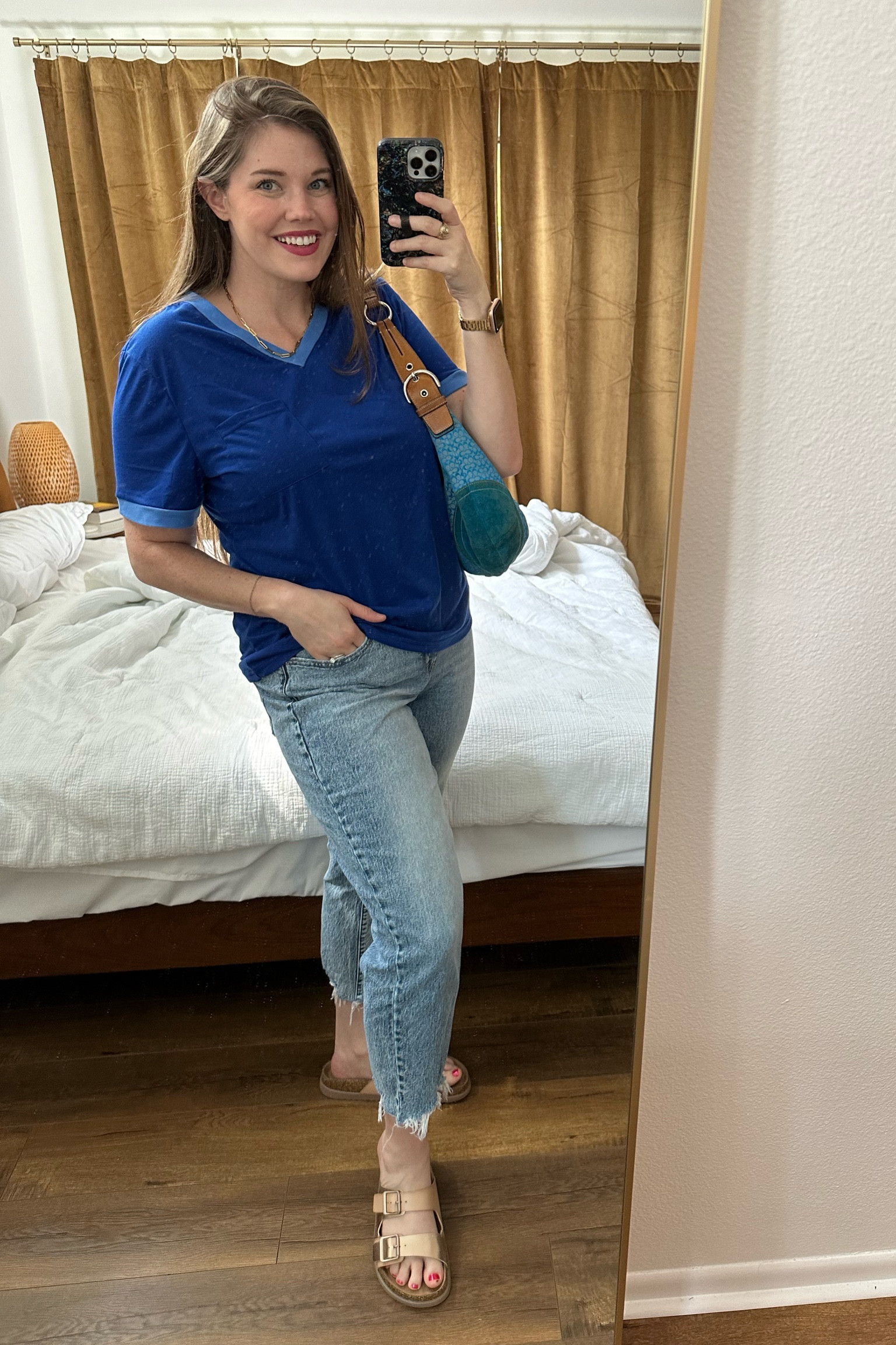 Summer outfit! Tee is from Walmart and is an Anthropologie dupe. Jeans are old Walmart and an agolde dupe. Sandals are old Walmart and a Birkenstock dupe! Purse is old Coach, so I linked some other cobalt blue bags.
......................
Summer tee summer top summer shirt Walmart finds Walmart new arrivals cropped jeans cropped denim revolve denim revolve jeans finger tee summer look midsize fashion size 14 fashion size large fashion midsize outfit blue purse cobalt blue top cobalt blue shirt v neck tee v neck shirt mom outfit mom uniform Birks dupes 

#LTKStyleTip #LTKShoeCrush #LTKItBag