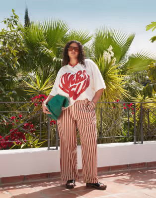 ASOS DESIGN Curve straight leg seersucker trousers in rust stripe | ASOS (Global)