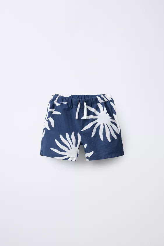 Shorts with elastic waistband and adjustable front drawstring. Front pockets and back patch pocke... | Zara US