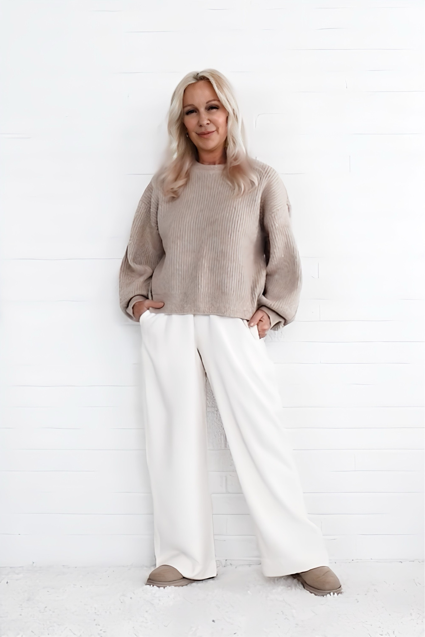 One common element of Scandinavian style or Stockholm style are these pajama style ivory pants paired with a bulky sweater. Yes, throw out that fashion rule about pairing loose with fitted. Scandi style features oversized fits for a comfy feel. These pants are incredibly cozy and ON SALE… I wear them with tights underneath for warmth.

#LTKStyleTip #LTKSaleAlert #LTKSeasonal