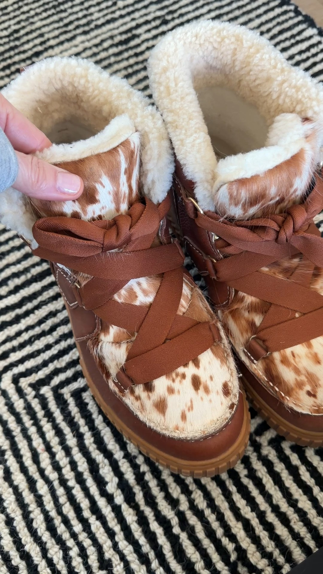 If between sizes, size up waterproof shearling boots 