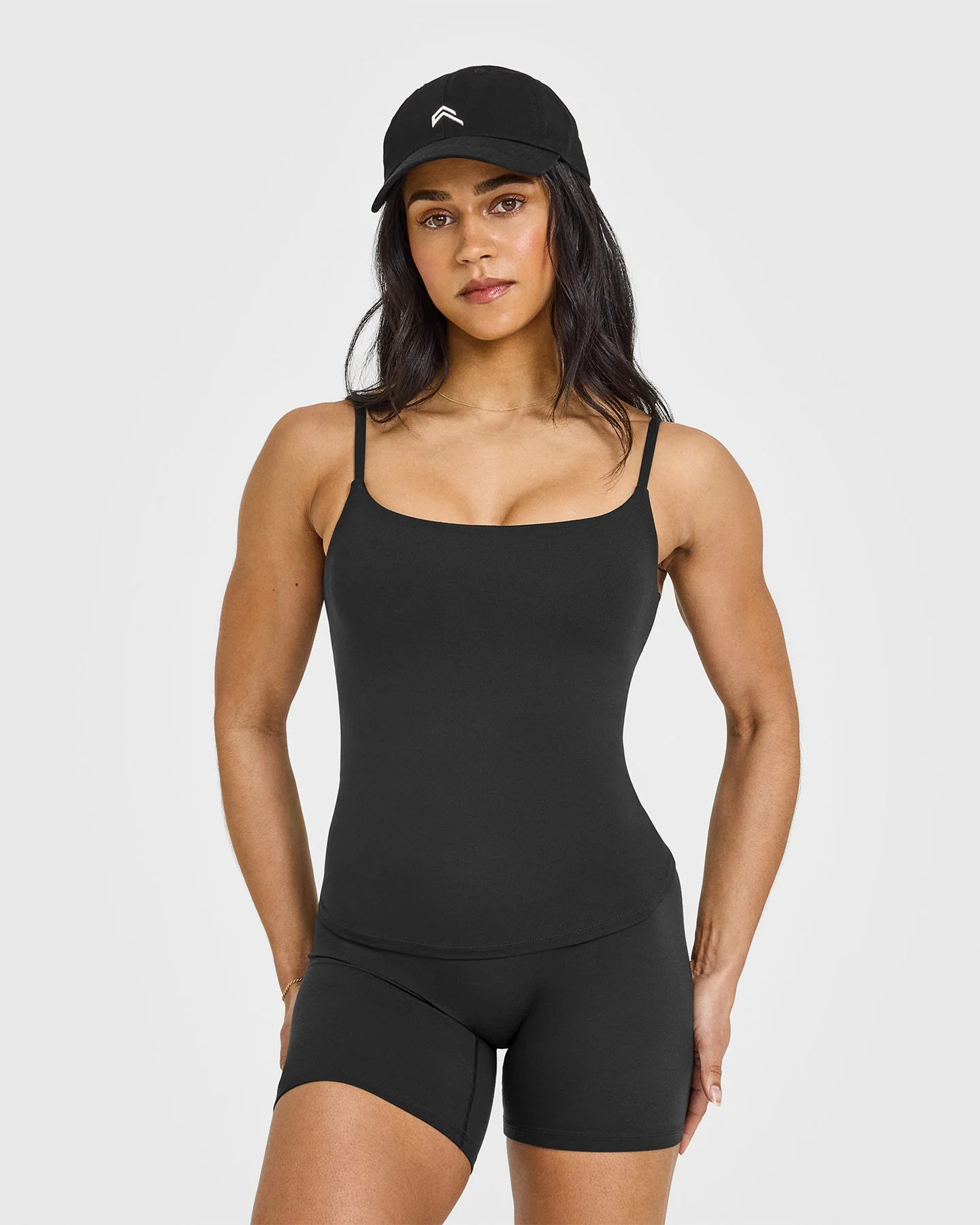 SoftMotion™ Strappy Vest with Built in Bra Shelf with White Logo 
 Soft Black | Oner Active (UK / US)