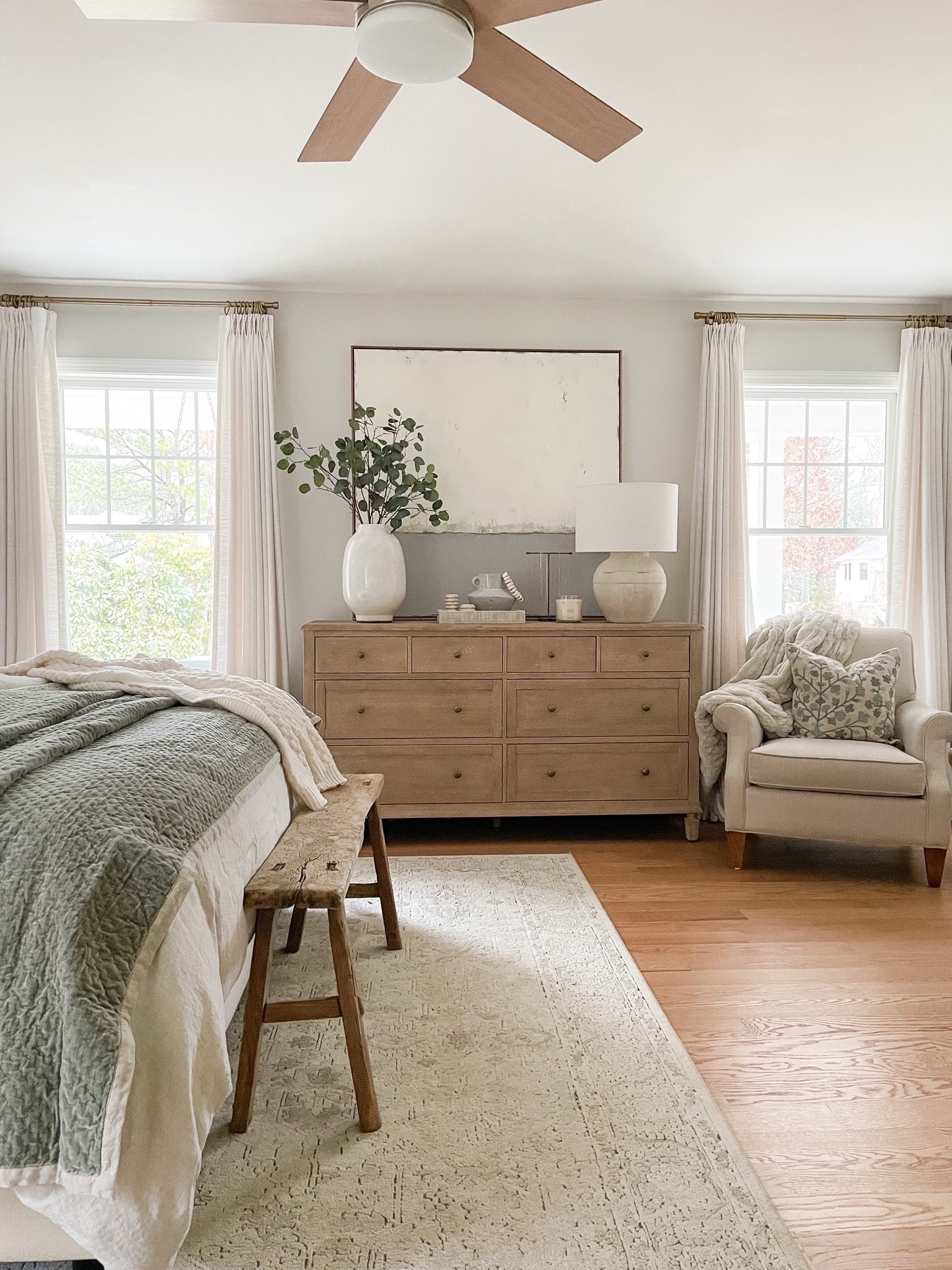 Coastal bedroom, Pottery Barn dresser, Amazon curtains, TWOPAGES curtains, Loloi rug, throw pillows and blankets, lamp, vase and stems, bench 

#LTKFindsUnder50 #LTKHome