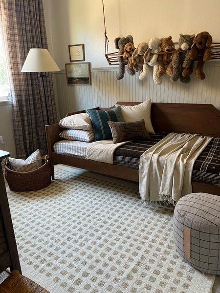 Neutral boys bedroom 

Earth tones beige brown blue stripes plaid check boat print spindle curved wood bed rug lamp plaid curtains lined organic modern traditional collected books throw blanket pillows wool linen 

#LTKhome #LTKstyletip #LTKfindsunder100