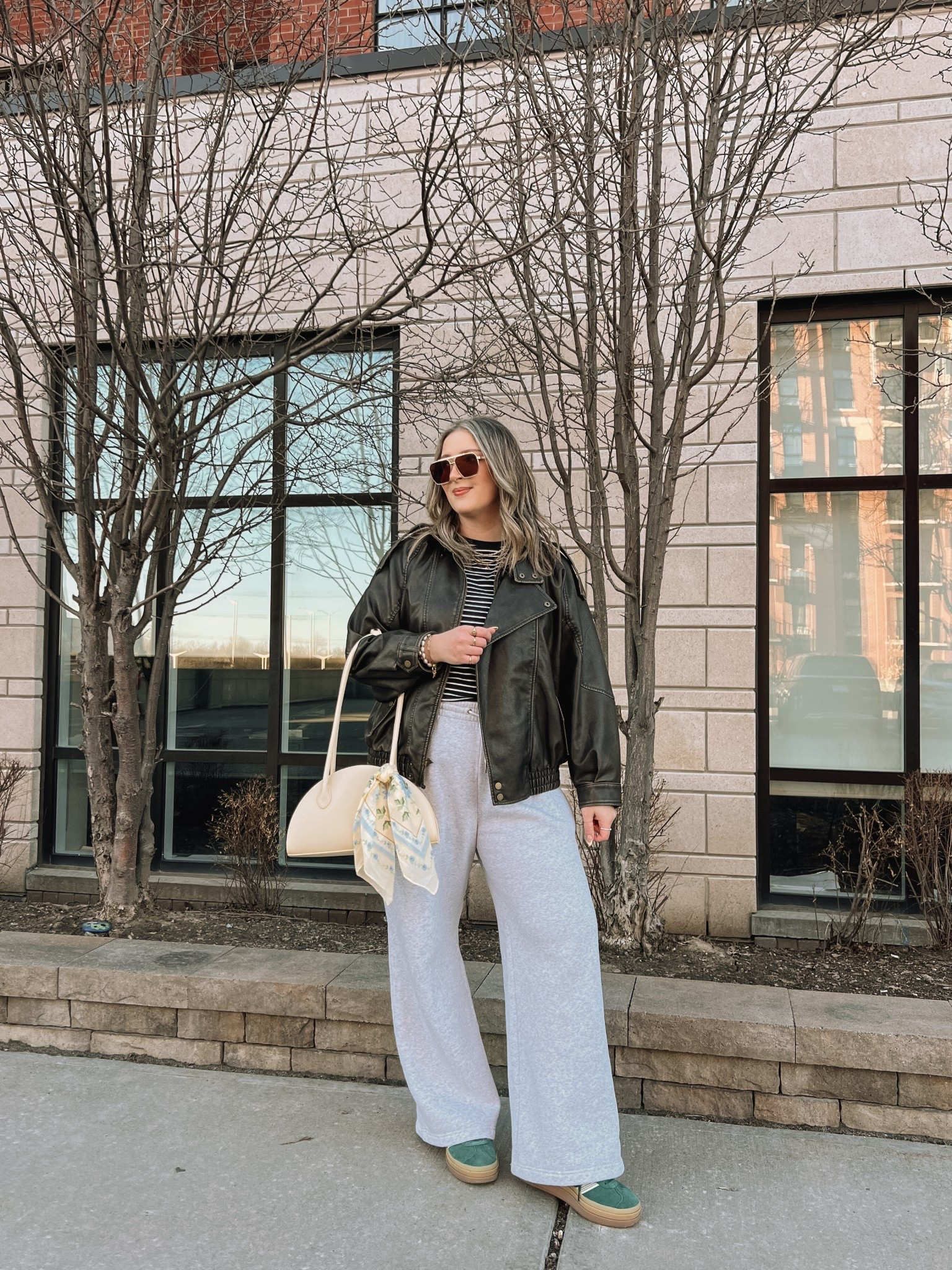 Comfy casual spring outfit! Jacket and sweatpants are part of the Abercrombie BOGO 50% off sale! Wearing my usual size L in the wide leg sweatpants (I love the thick material of these!) and L in the leather jacket. Sized up to XL in the tee cause I have a larger chest. Bag and scarf are Old Navy, Canadian links under “similar products”. Adidas gazelle sneakers run a little big, I’m a 9.5-10 and wear a 9.

#LTKsale #LTKstyletip #LTKmidsize