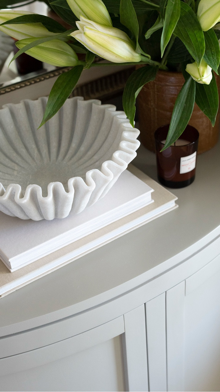 My nightstand styling formula... books, florals, a coaster, a catch all, and a glass or carafe for water. Keep it simple!

#LTKHome