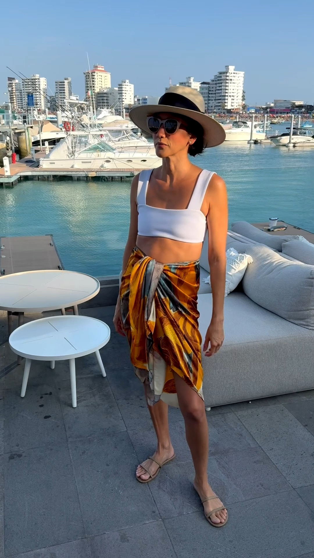 Bandeau top, silk pareo, Tkees sandals, straw hat: Summer ready

#LTKOver40 #LTKTravel #LTKSwim