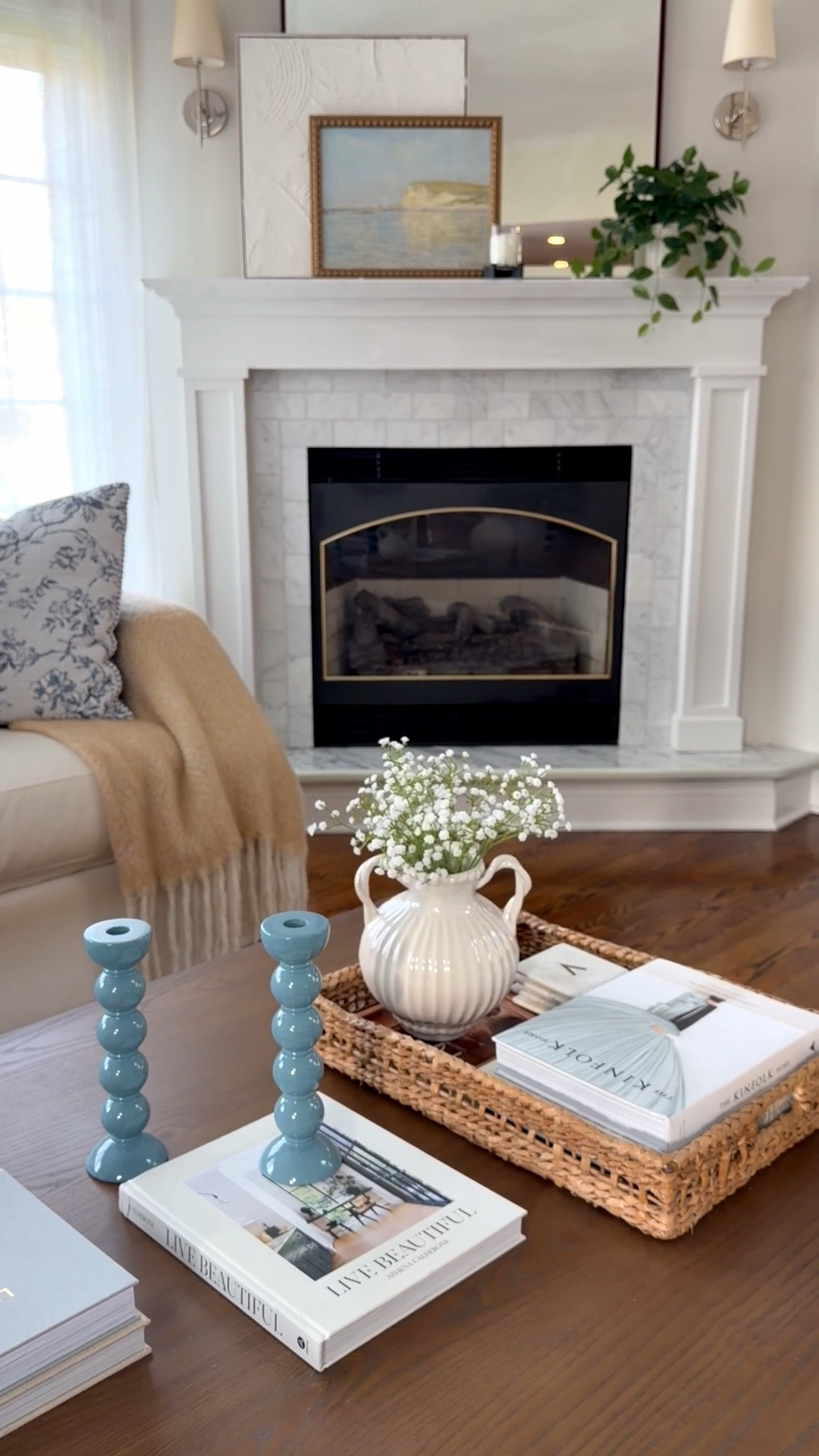 Spring Living Room Refresh - Blue, White & Tan Accent Colors

.
.
Spring Coffee table styling | spring mantle inspo | spring artwork | spring throw pillows in light blue and white 
#targetstyle @Target 

#LTKSeasonal #LTKHome #LTKSaleAlert