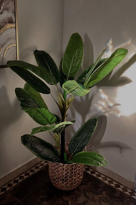 Is this faux real? 😉 it’s almost rude to call her fake. Loving my new faux banana leaf plant. This is as low maintenance as it gets. If you have an area with low sunlight or simply want something that will last a long time (and keep its shape/color) consider this banana leaf plant under $90 a great buy. But hurry — it’s on sale now and goes up to $150 soon! 

#LTKunder100 #LTKSeasonal #LTKhome