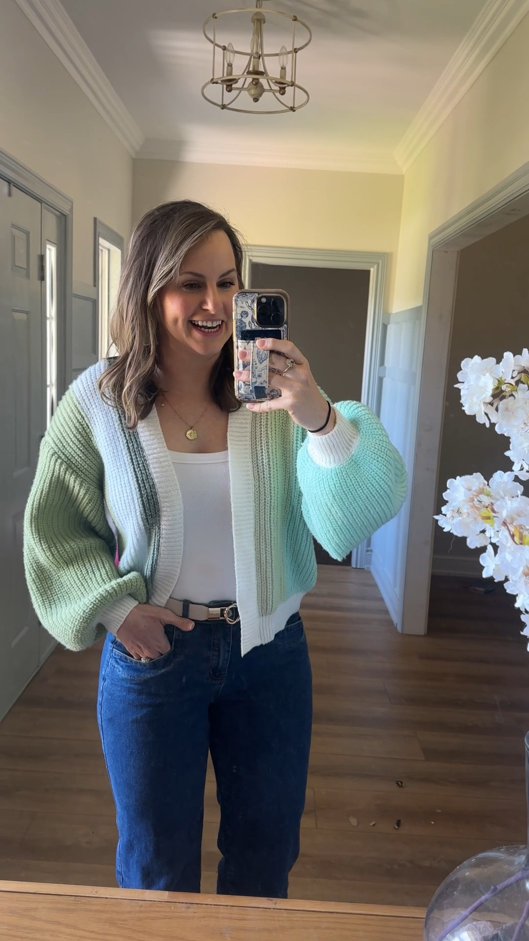 Sunday church outfit of the day! Also headed to lunch at a friends and learning to play Mahjong! 🀄️ loving this green colorblocked cardigan and jeans from Amazon. Wearing size m/6. Also this plain white tank is reversible to a high neck! Runs small, so if in between sizes I’d go up one! 

#LTKMidsize #LTKootd #LTKSeasonal