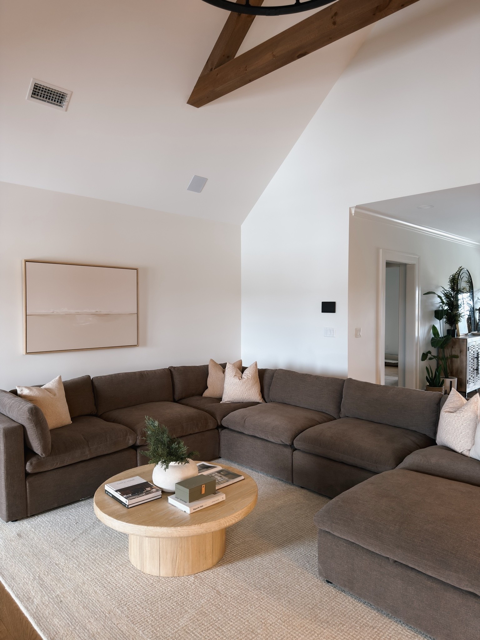 A moody brown couch to bring some depth into the living room 🤎

#LTKHome #LTKSaleAlert