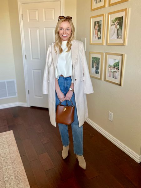 Wearing XS in sweater, linked similar options. 26S in jeans and XSP in coat (also linked similar) | winter whites, white coat, winter coat, cream sweater, white sweater, straight jeans, casual winter outfit, winter outfit, brunch outfit, coffee date outfit 

#LTKfindsunder100 #LTKstyletip #LTKSeasonal