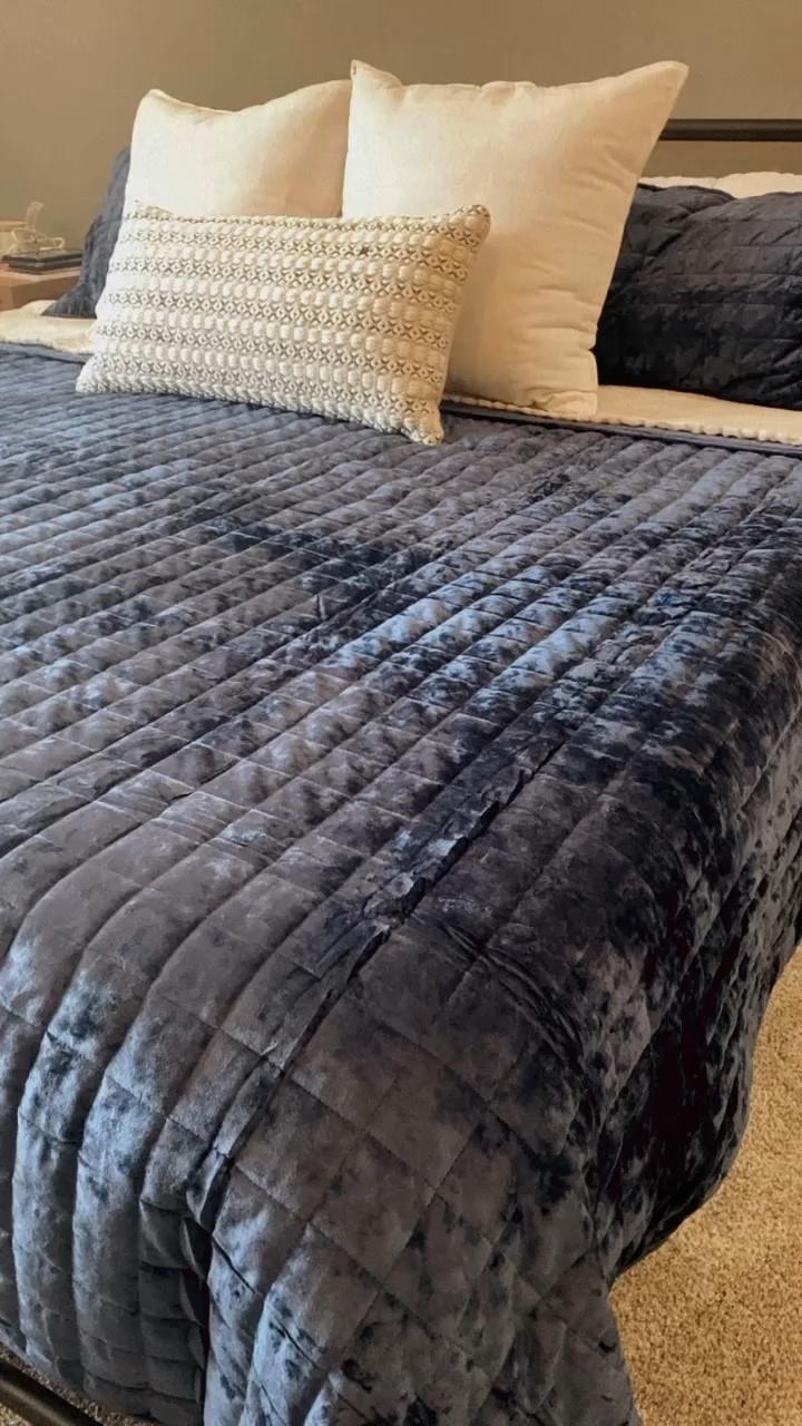 Proof working with what you have + a few details like bedding and art make a BIG impact. 
:
Those end tables are smaller which helped balance the room. They are also a lighter color, which was needed to brighten the room, as it originally had lots of dark pieces. 

#LTKfamily #LTKfindsunder100 #LTKhome