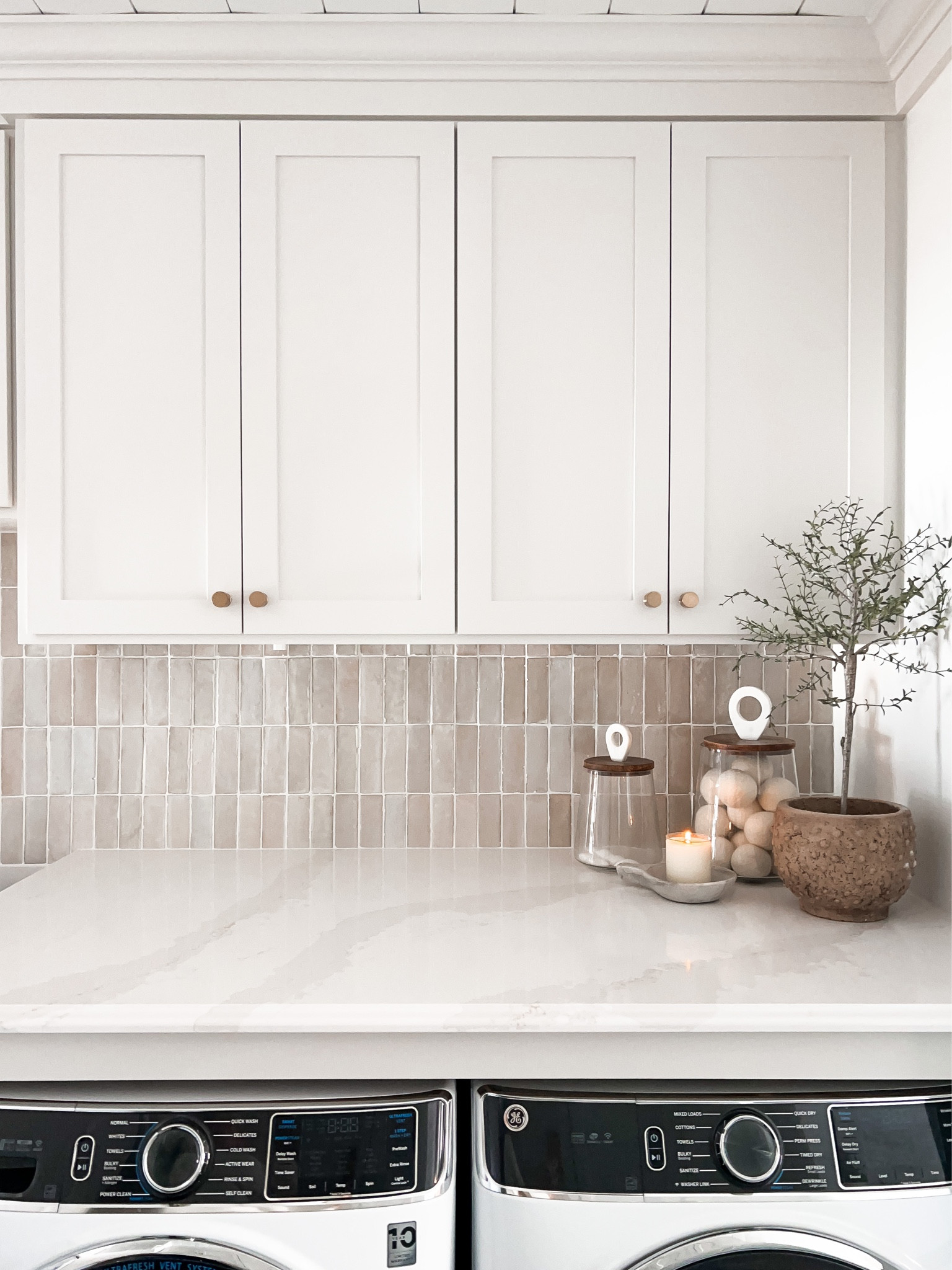 Laundry room detail, dryer balls, amazon finds, glass jars with lids, glass canister with wood lid, topiary tree, vintage Hobnail pot, found marble dish

#LTKFind #LTKstyletip #LTKhome