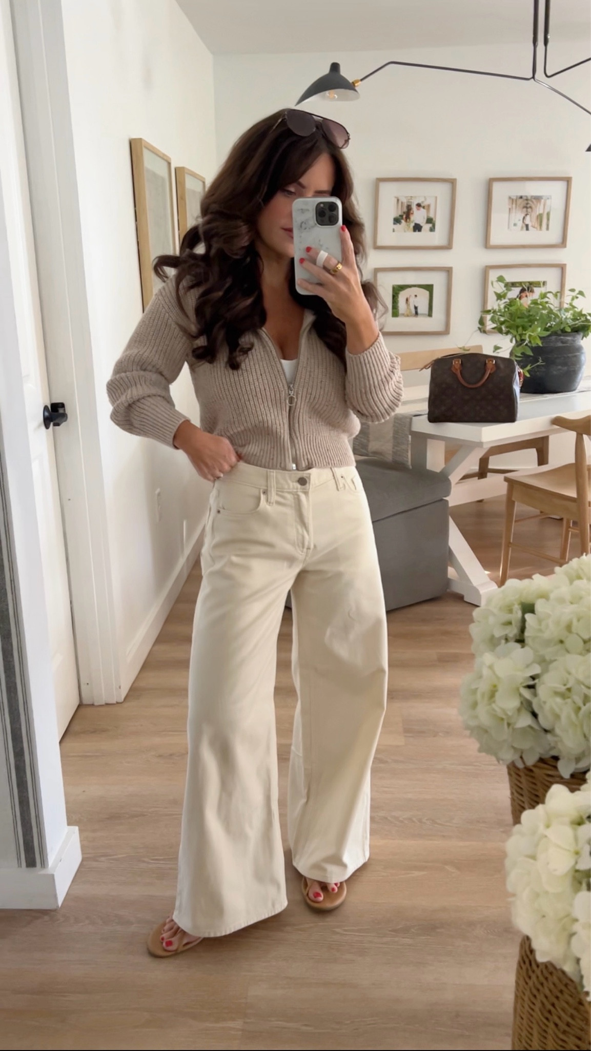 Tank in a small 
Sweater in a small 
Jeans in a 25 petite 
Shoes true to size

Ivory jeans cream jeans beige denim wide leg 

#LTKStyleTip #LTKFindsUnder100 #LTKFindsUnder50