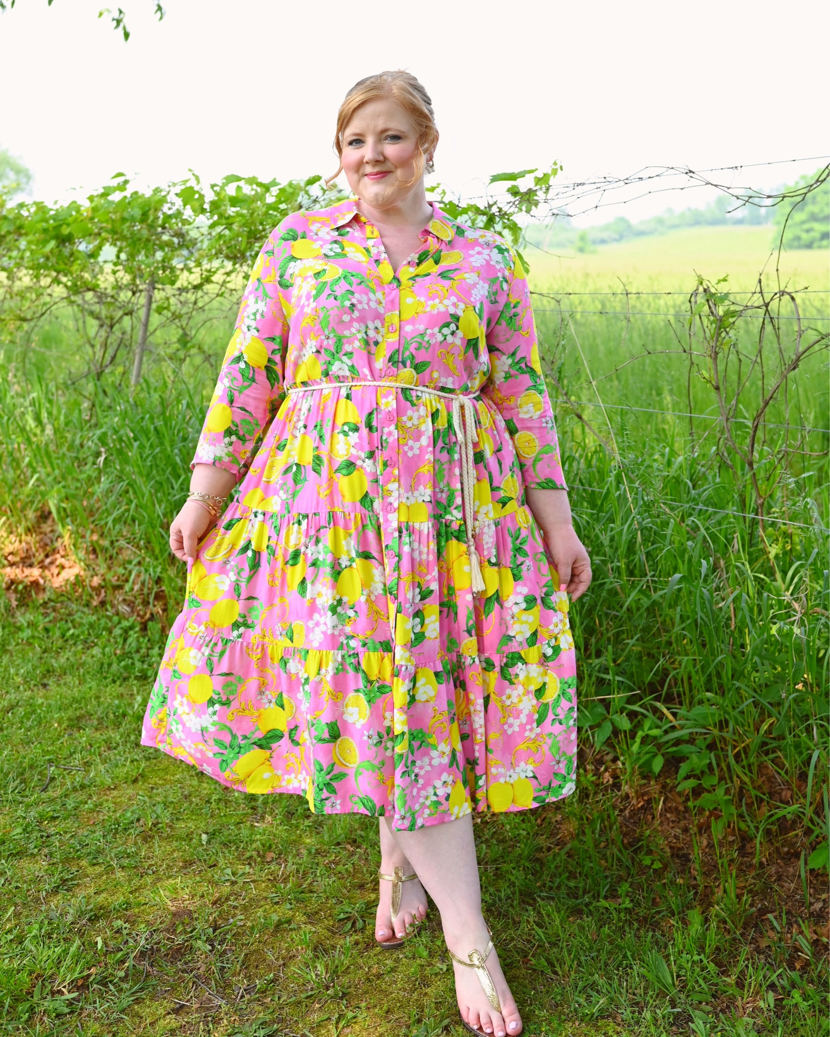 Plus Size Pink Lemon Print Shirtdress 🩷🍋

This Plus Size Pink Lemon Print Shirtdress is available in sizes 12-30, and I’m wearing the size 18. The fabric is a soft lightweight viscose with minimal stretch, so if you’re between sizes at Ulla Popken, you may want to go with your larger size if you typically need extra room through the shoulders and upper arms. I currently wear between a 16 and 18 at Ulla Popken, and the 18 is a perfect fit.

This is a true shirtdress that buttons all the way down the front with a classic collared neckline. It comes with a removable rope belt which attaches via beltloops at the waist. It also features pockets for a relaxed look and feel. This is such a vibrant and beautiful day dress option. I’ll wear this for everyday and afternoons out, but you could also dress it up for a fancy brunch with the girls or even a baby/bridal shower. It’s priced at $79.95 which makes it just $52 with my code LIZULLA!

#LTKFindsUnder100 #LTKSeasonal #LTKPlusSize