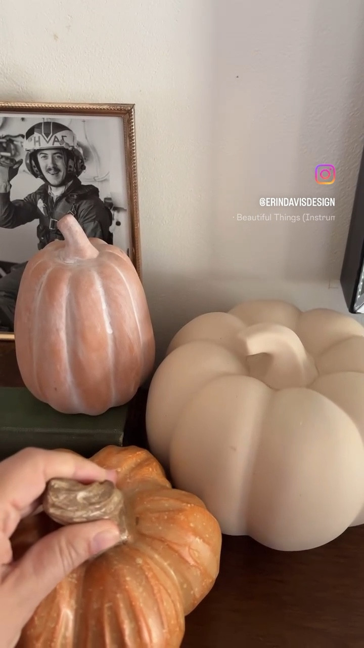Fall decorating with faux ceramic pumpkins and terracotta pumpkins. I also love these battery operated pillar candles 

#LTKSeasonal #LTKHome