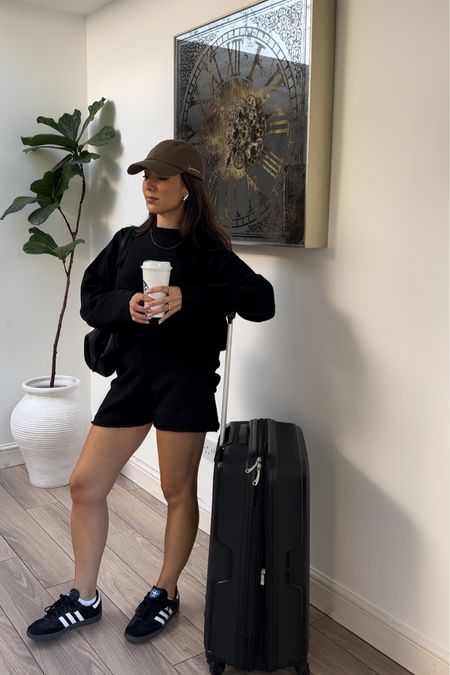 Travel outfit, knitted co-ord, black co-ord, black sweater, black knitted shorts, jacquemus cap, cap, travel style, airport outfit, casual outfit, minimal outfit, adidas samba, adidas samba og, H&M

#LTKBacktoSchool #LTKtravel #LTKSeasonal
