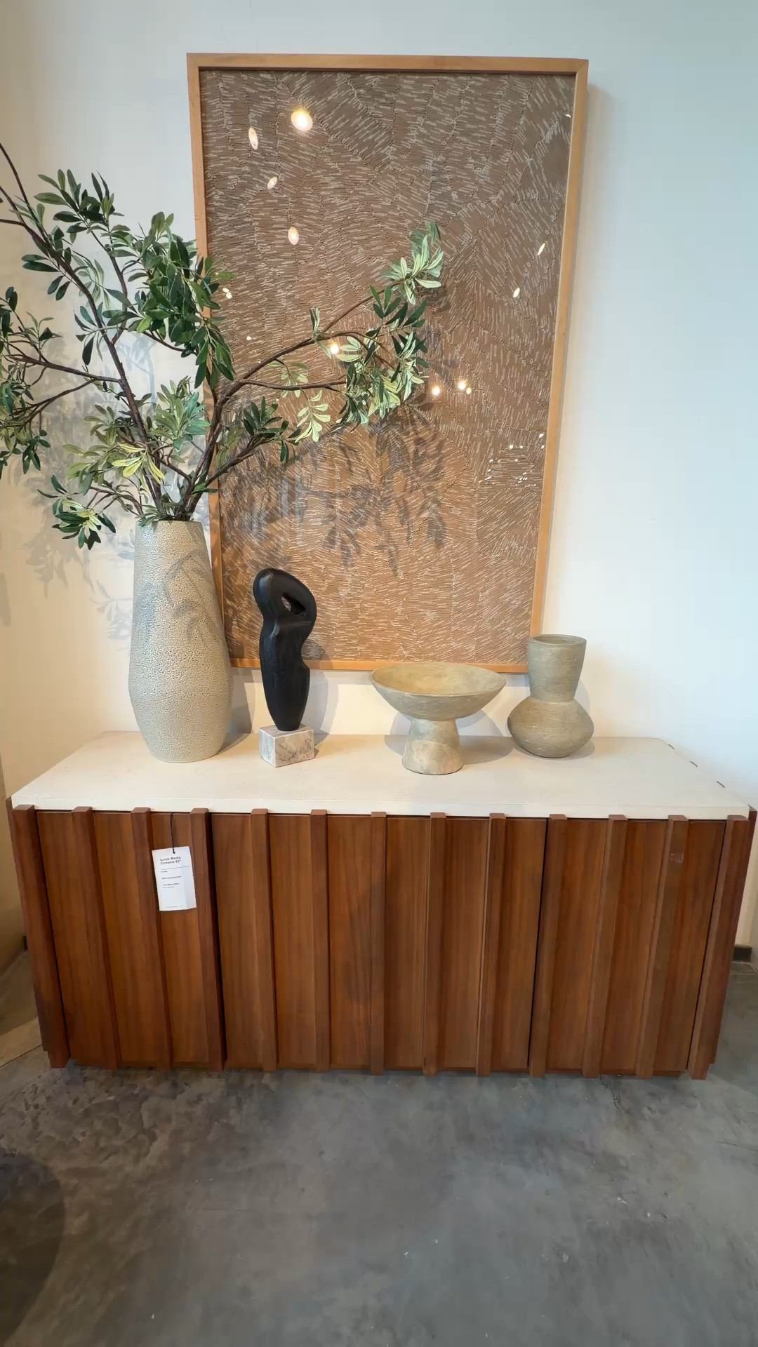 One of my favorite details? The mix of materials! 😍 The Louis Media Console from West Elm combines a smooth concrete top with rich paneled wood for a look that’s modern, sophisticated, and full of character. 🤎 It’s the perfect balance of clean contemporary design and natural warmth, with plenty of storage to keep your living room looking polished. ✨I’ve linked it, along with similar media console styles, in my LTK! 🙌🏻 @west elm #mediaconsole #credenza #homeinspo

#LTKHome #LTKSaleAlert