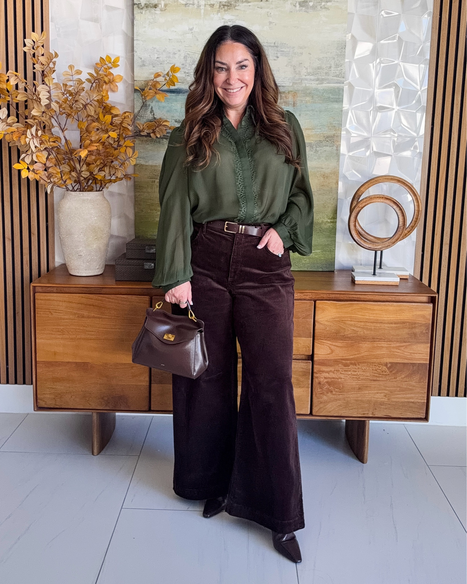 Olive lace blouse + chocolate corduroy wide-leg pants 🍂 The fall color combo I keep reaching for! The blouse has the prettiest lace but it is sherr so add a cami and the cords are so flattering and cozy 🤎

Sizing: Blouse TTS, L | Pants TTS, L 

 #LTKover40 #LTKstyletip #LTKmidsize #LTKworkwear